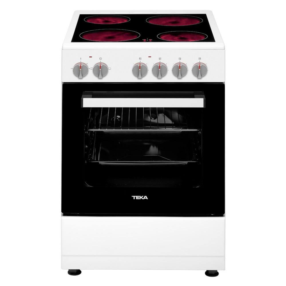 Horno Teka blanco. Cuatro placas rojas, con mandos. Puerta negra con asa.