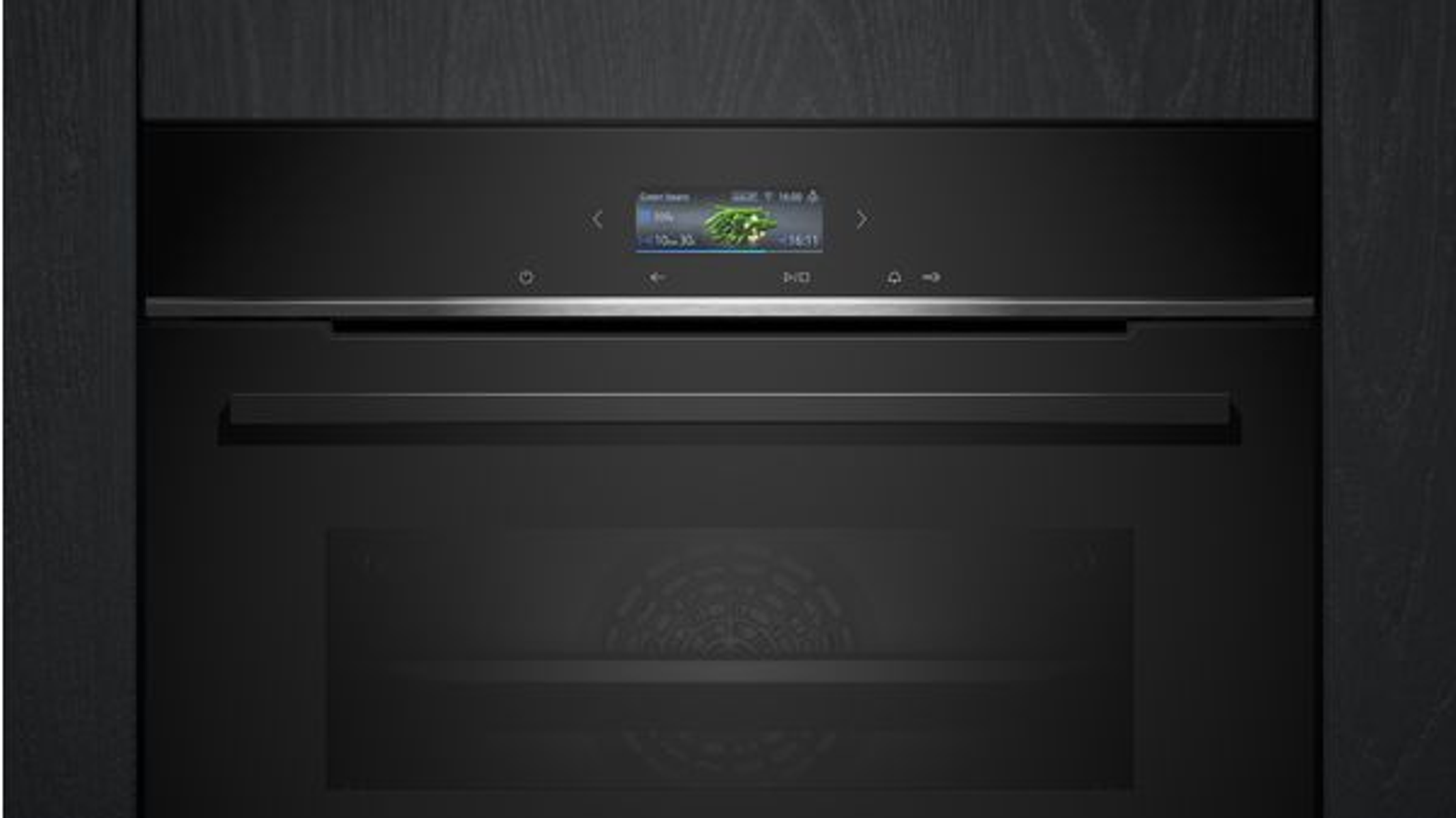 Horno negro con pantalla táctil. Está colocado en un mueble de cocina oscuro.