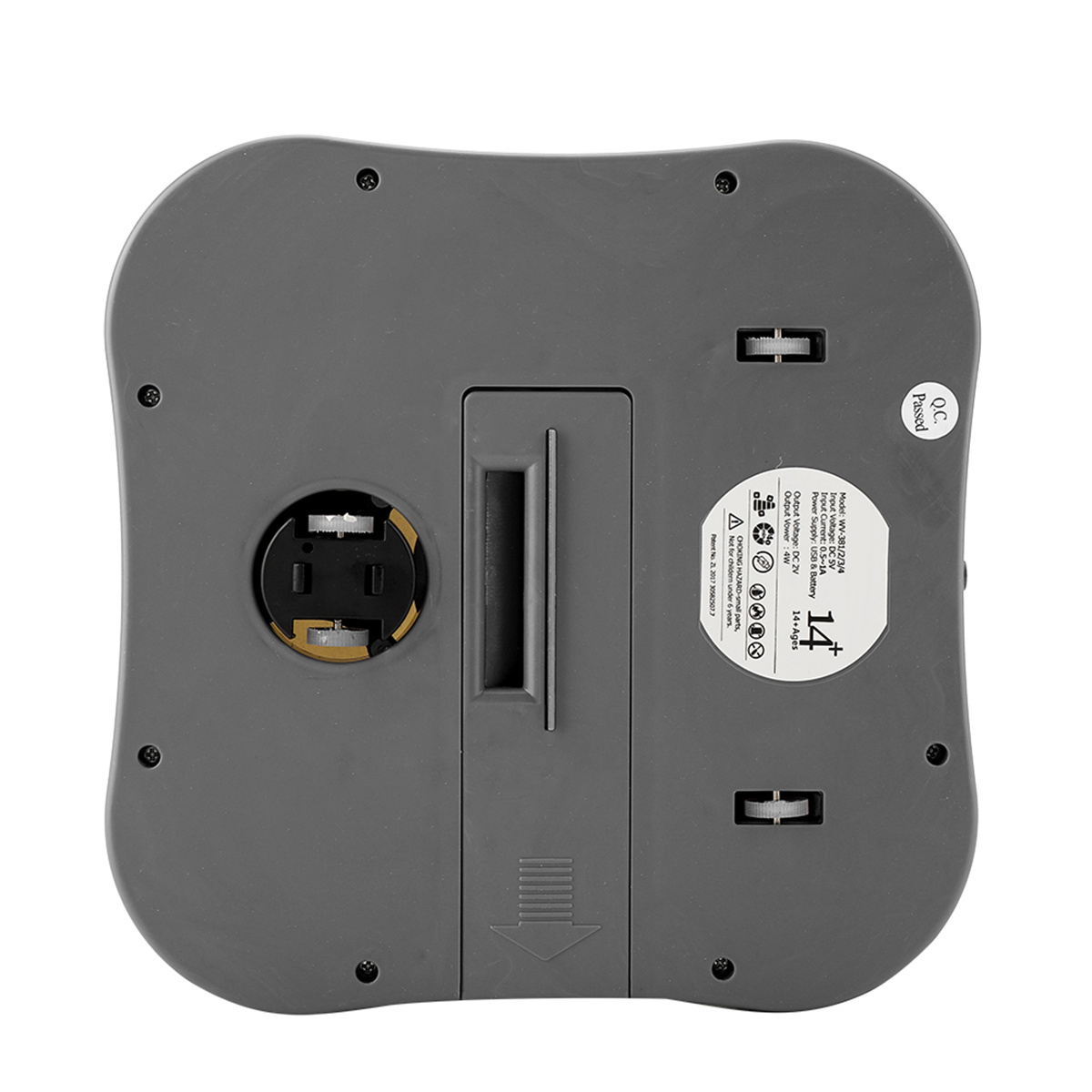 Graues elektronisches Gerät, Unterseite, mit Batteriefach und Bedienelementen.
