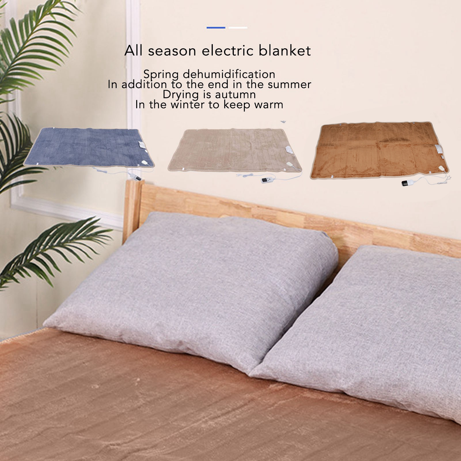 Drei elektrische Decken auf einem Bett. Farben: Blau, Beige, Braun. Kissen im Vordergrund.