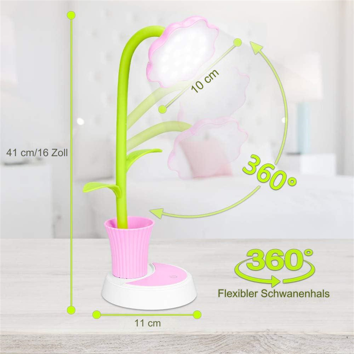 Eine blütenförmige Schreibtischlampe mit Abmessungen, mit grünem Stiel und rosa Blütenblättern.