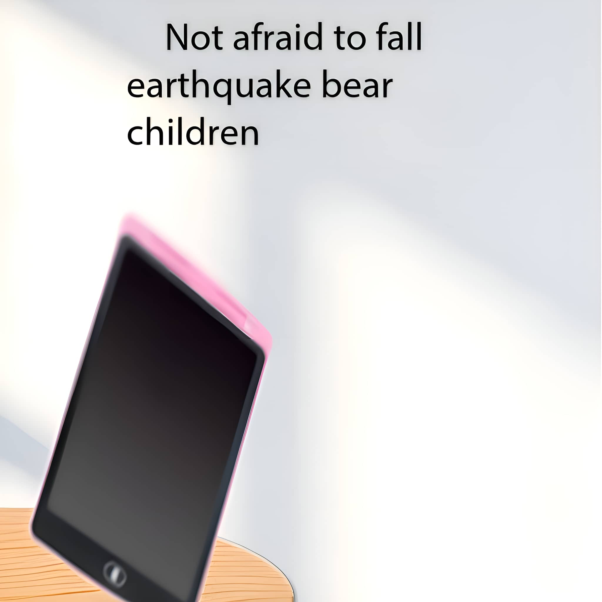 Ein rosa Tablet auf einer Holzoberfläche, mit Text darüber. Text beinhaltet 'Keine Angst zu fallen'.