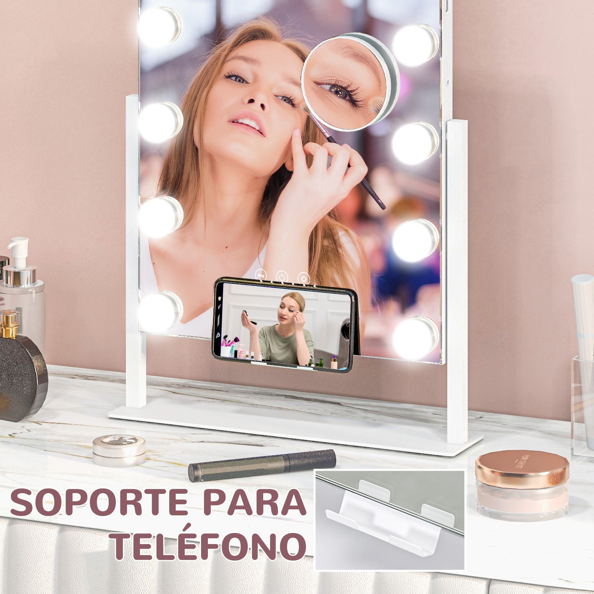 Una mujer se maquilla frente a un espejo de tocador iluminado con soporte para teléfono.