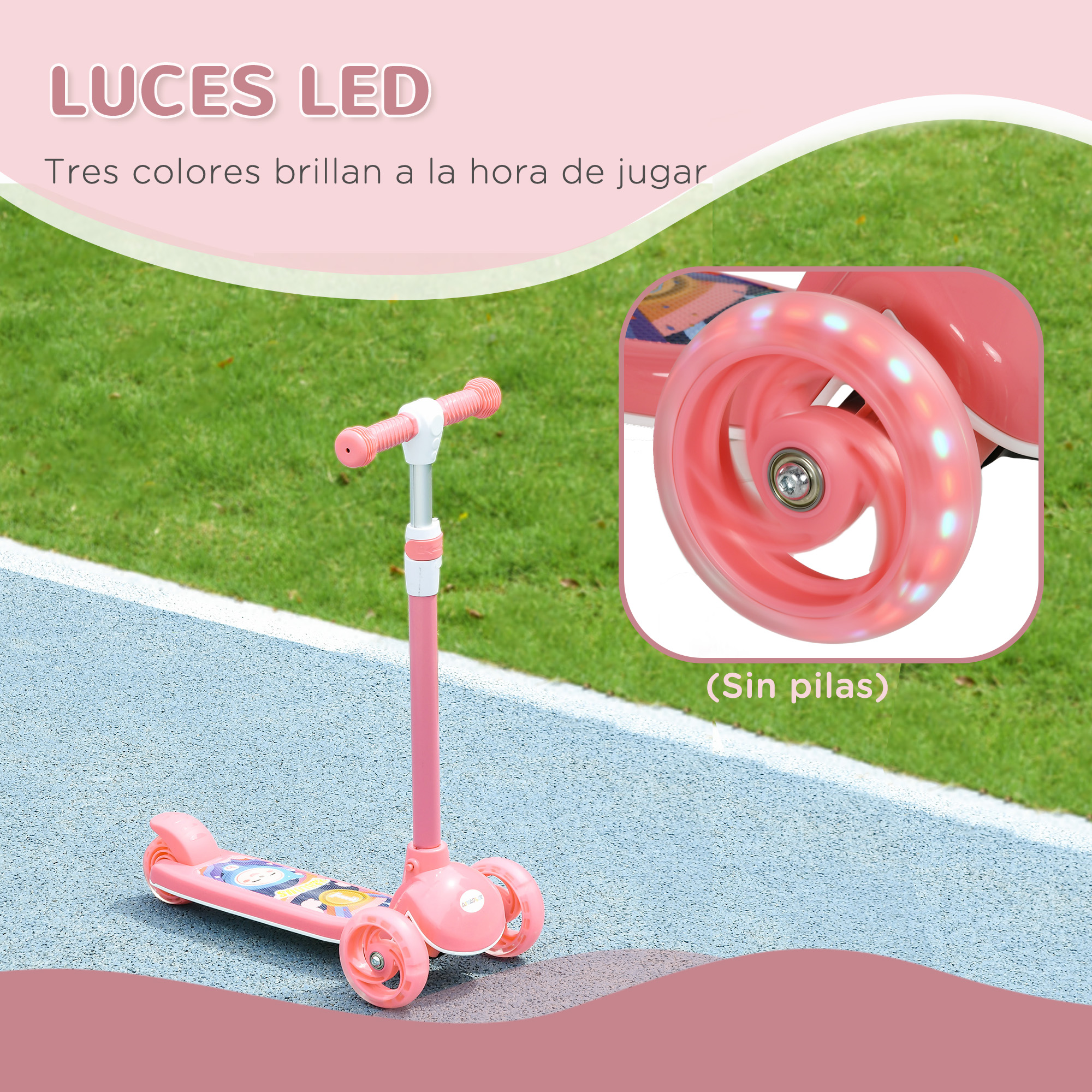 Scooter rosa con tres ruedas, luces LED y manillar rosa, sobre superficie gris con hierba verde de fondo.