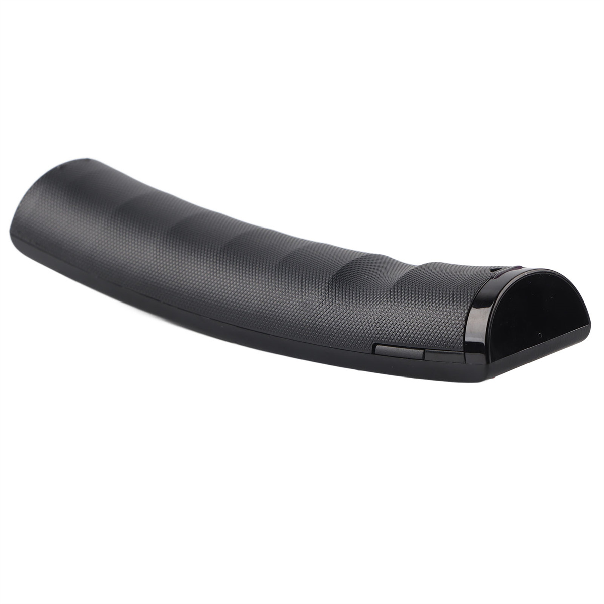 Eine schwarze, ergonomische Handballenauflage mit strukturierter Oberfläche und abgerundetem Ende.