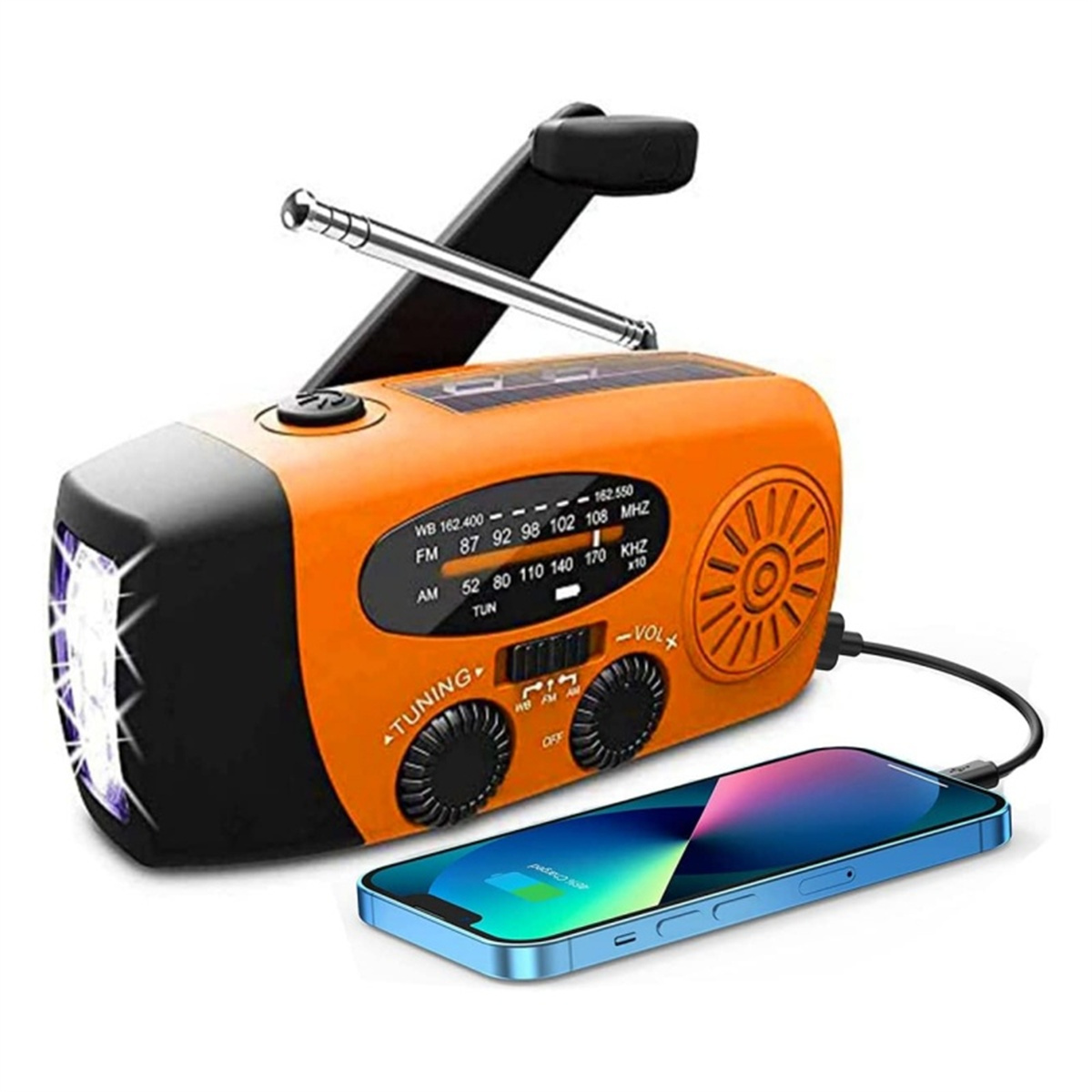 Oranges Notfallradio mit Taschenlampe und ladendem Telefon.