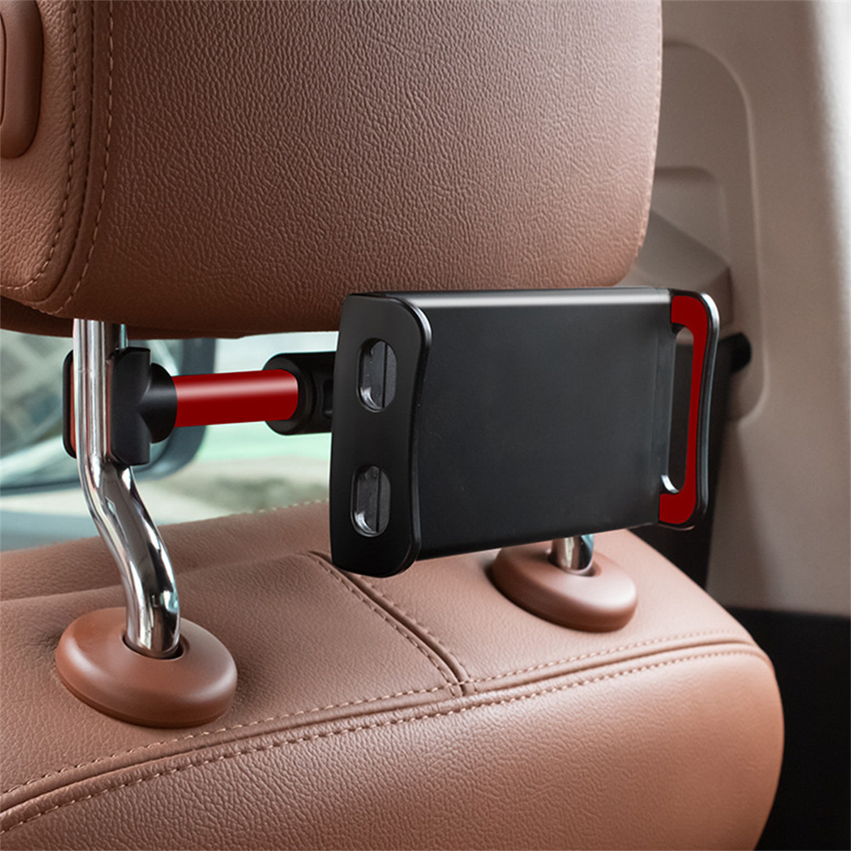 Kfz-Kopfstützenhalterung mit befestigtem Telefon. Brauner Autositz.