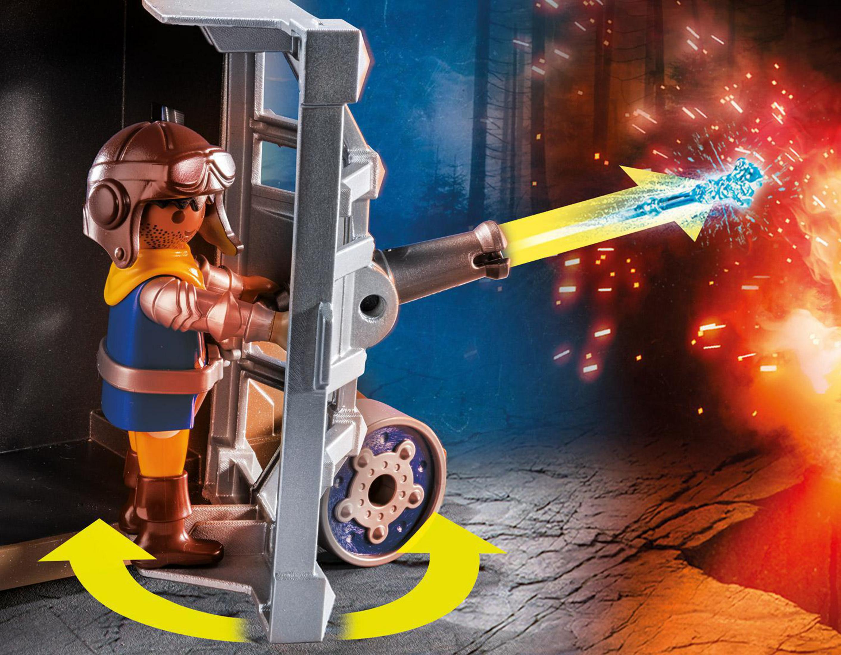 Una figura de caballero Playmobil disparando un cañón. El cañón dispara un rayo de energía azul.