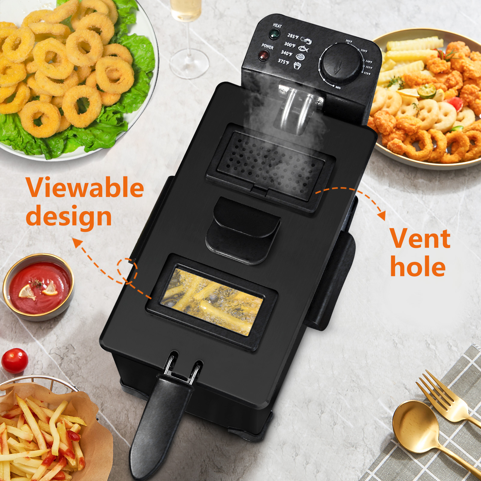 Freidora negra con comida. Aros de cebolla, papas fritas y ketchup visibles. Sale vapor.