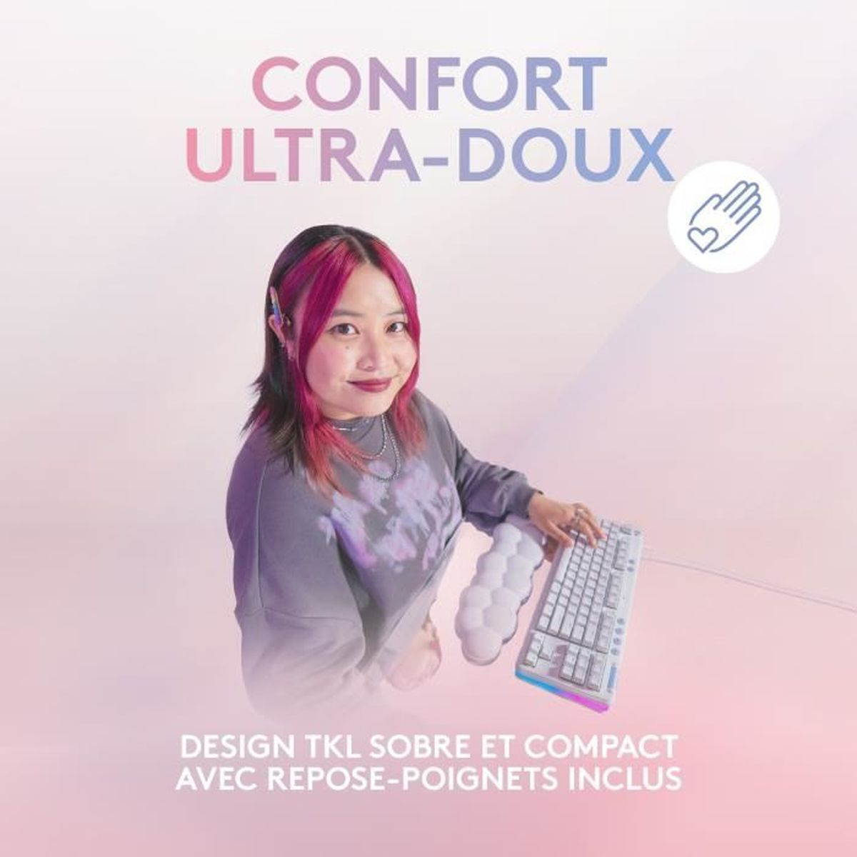 Kobieta z różowymi włosami i klawiaturą z podpórką pod nadgarstek. Tekst brzmi 'CONFORT ULTRA-DOUX' i 'DESIGN TKL'.