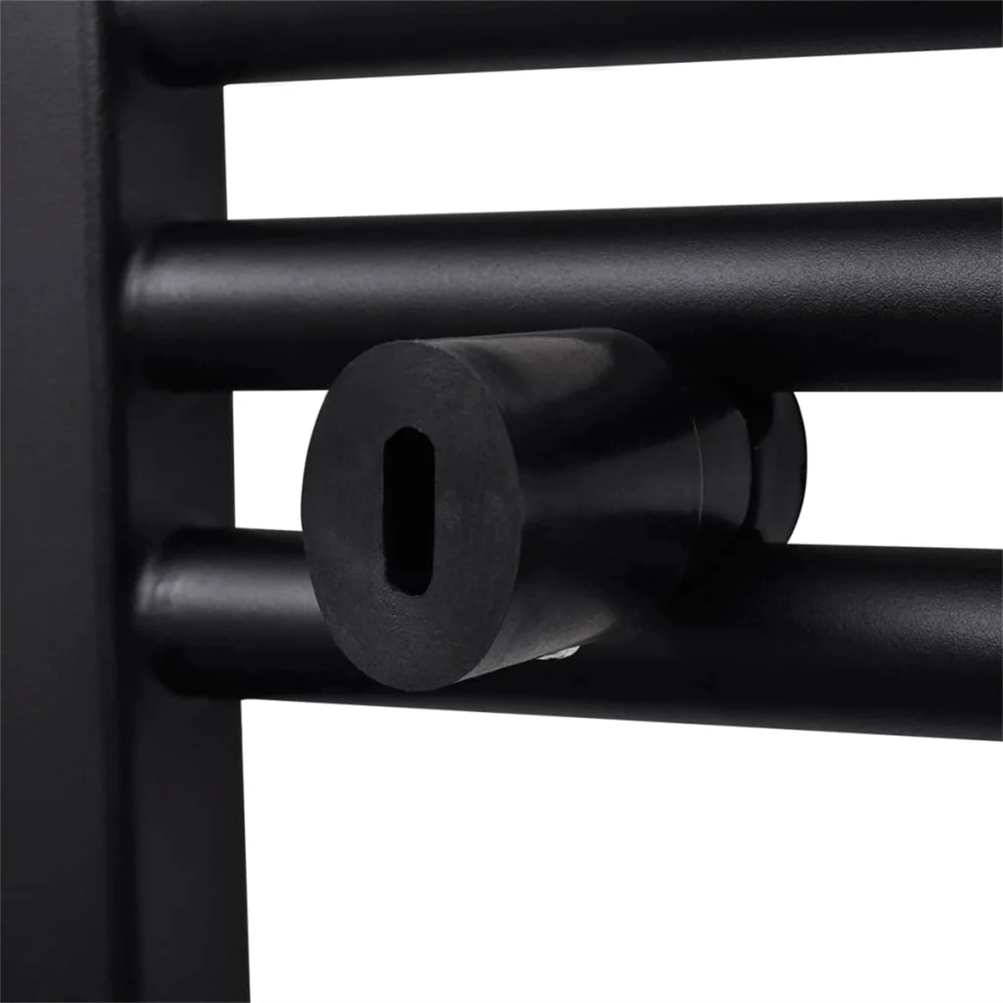 Nahaufnahme von schwarzen Metallstangen mit einem schwarzen zylindrischen Knopf.