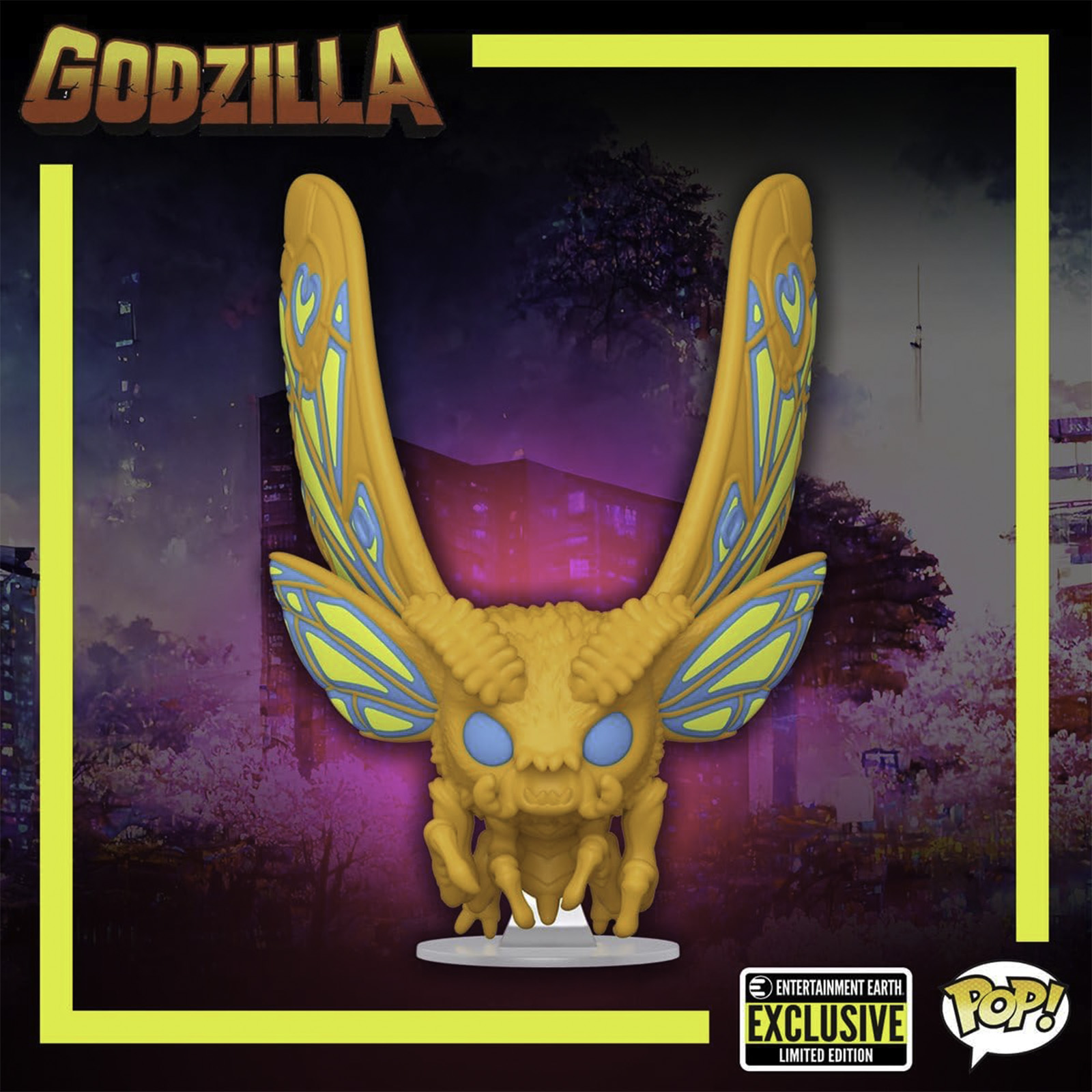 Godzilla-Figur mit orangefarbenem Körper und blauen Flügeln. Die Flügel haben gelbe Details. Auf einem Ständer und rotem Hintergrund.