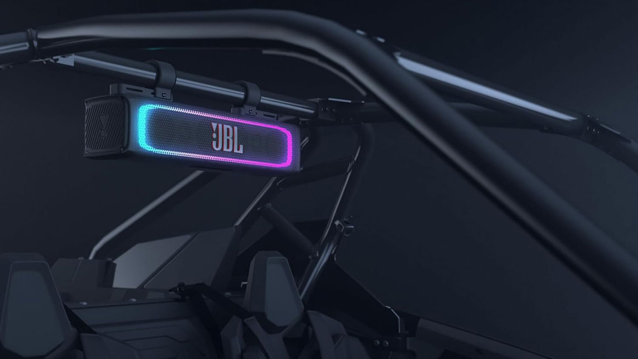 A JBL speaker with RGB lights mounted on the top of a buggy.