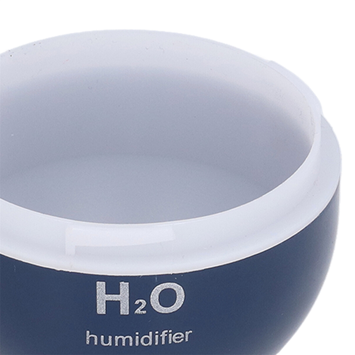 Draufsicht auf einen dunkelblauen Luftbefeuchter mit weißem Deckel und H2O-Text.