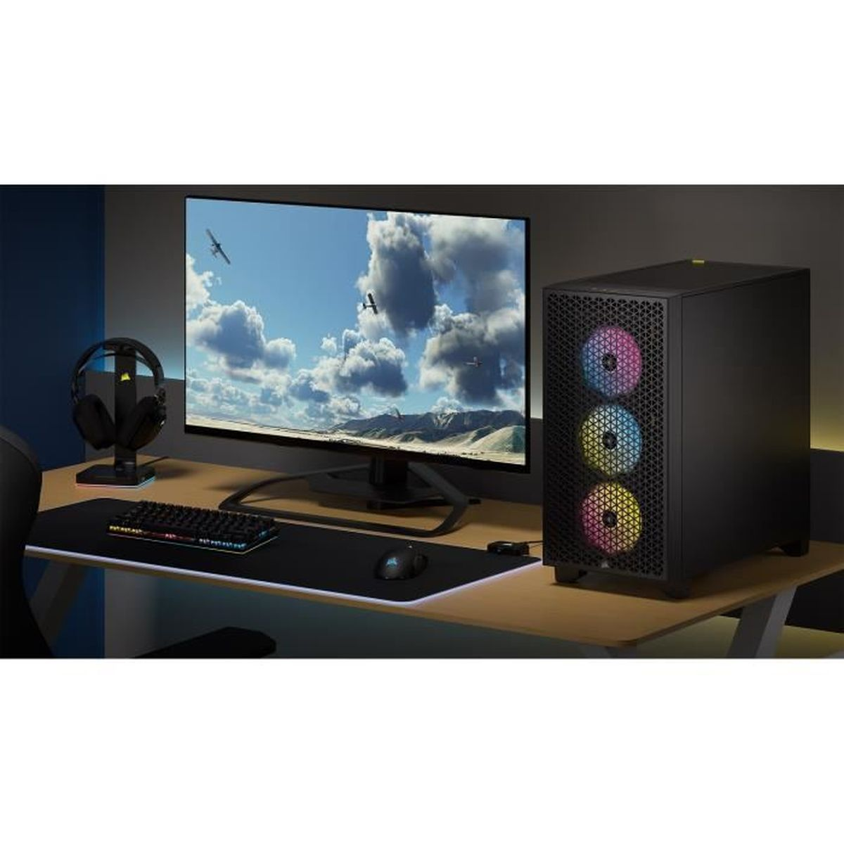 Konfiguracja komputera do gier z monitorem, klawiaturą, myszką i słuchawkami.