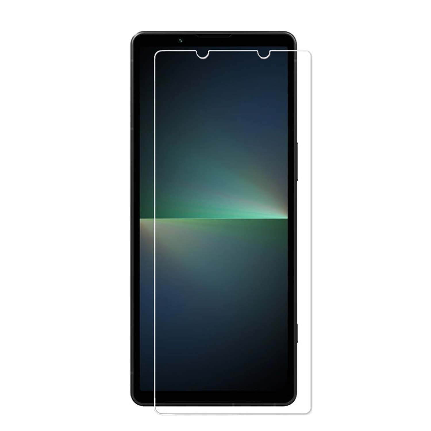 Smartphone avec protecteur d'écran appliqué. L'écran affiche un dégradé de vert foncé à noir.