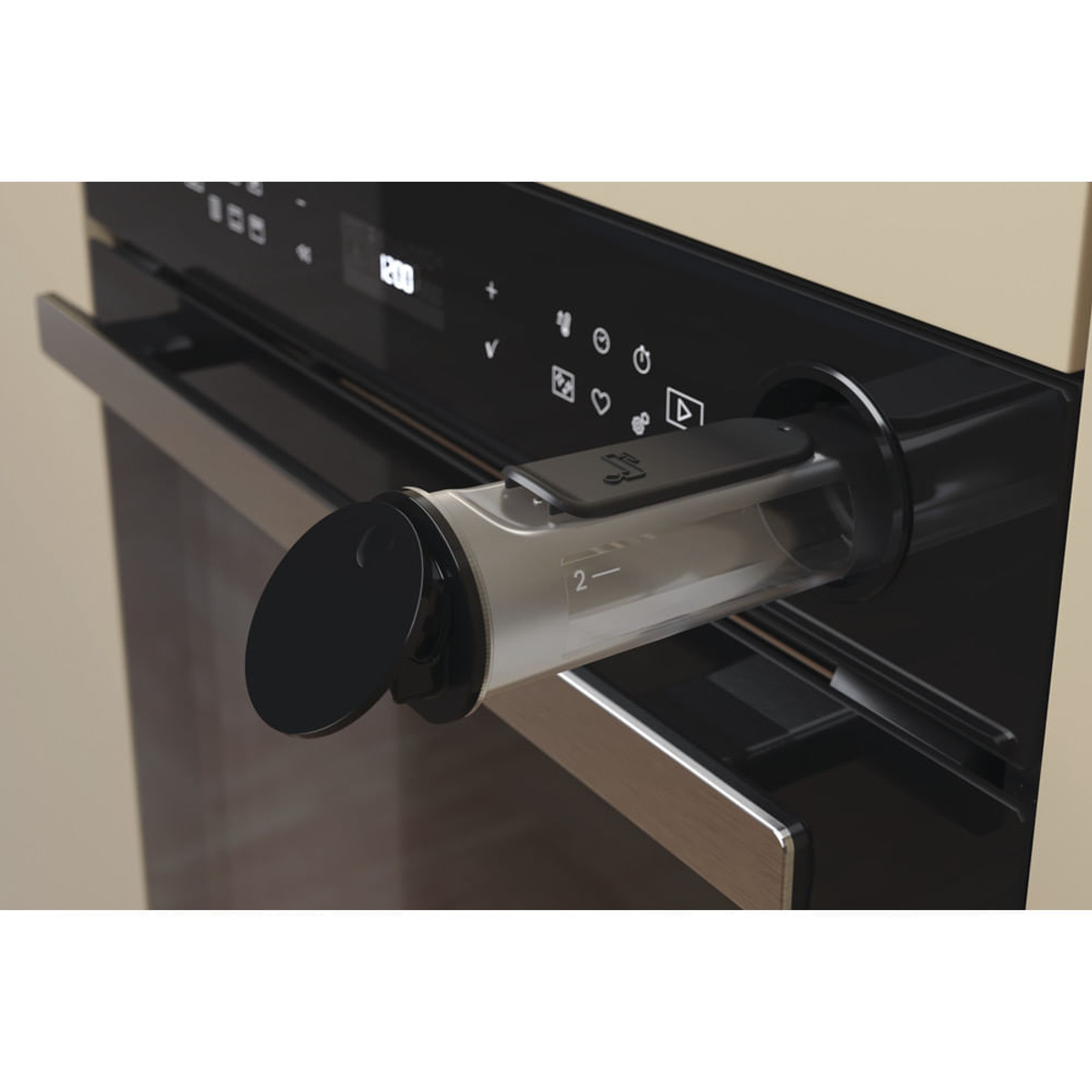 Primer plano de un panel de control de horno negro con dispensador de agua.