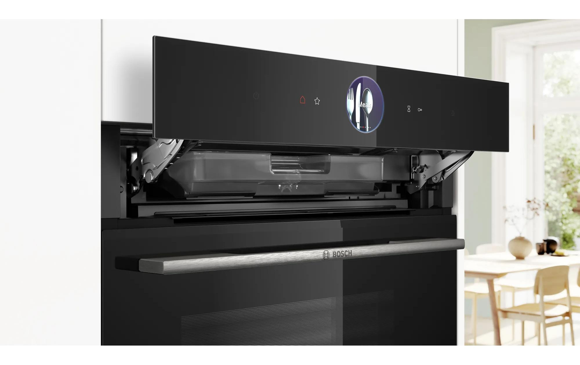 Een open Bosch oven met glazen deur, RVS handgreep en verlicht interieur.