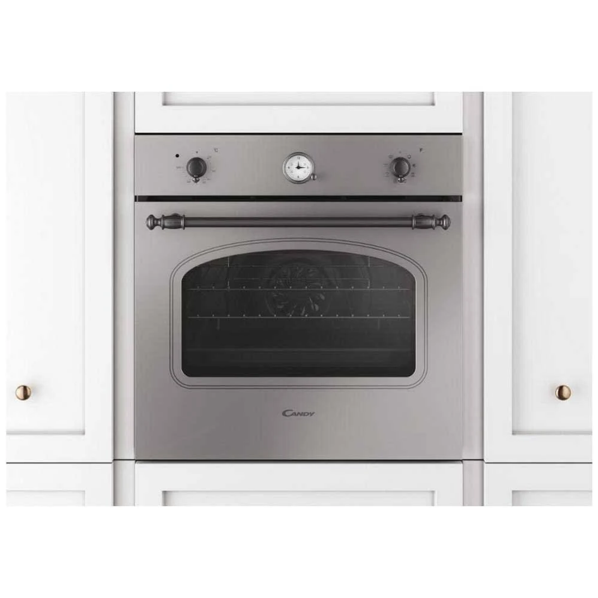 Un forno integrato in un mobile bianco. Ha frontale argentato, manopole e una porta.