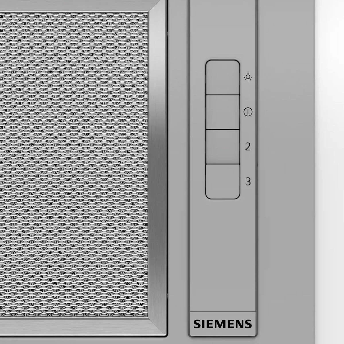 Düğmeler ve metal bir ağ filtreli bir Siemens davlumbaz kontrol panelinin yakın çekimi.
