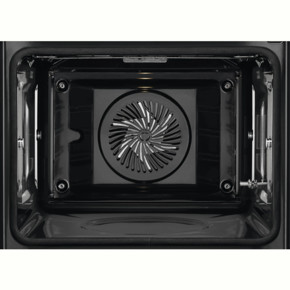 Primer plano del interior del horno con ventilador, interior negro. Horno vacío.