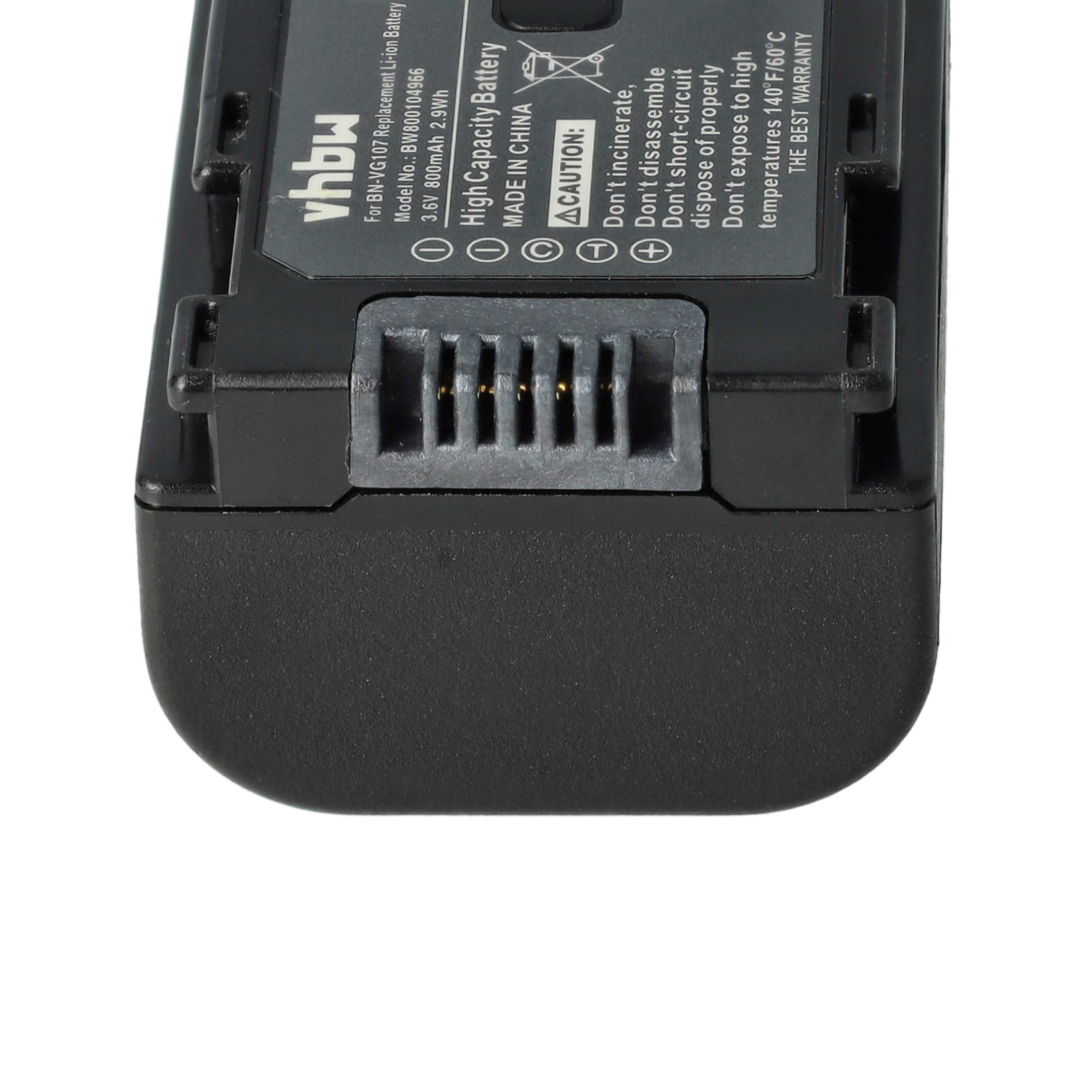 Ein schwarzes Batteriepack, mit einem Schlitz und sichtbaren Warnhinweisen.