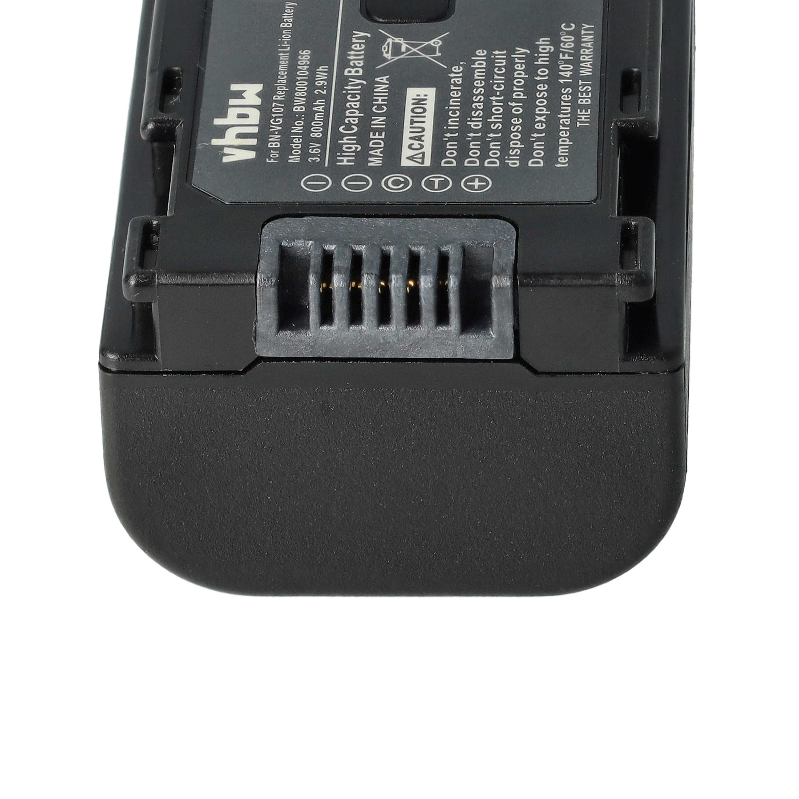 Eine schwarze Batterie mit Etikett und Warnttext. Sie hat einen grauen Anschluss.