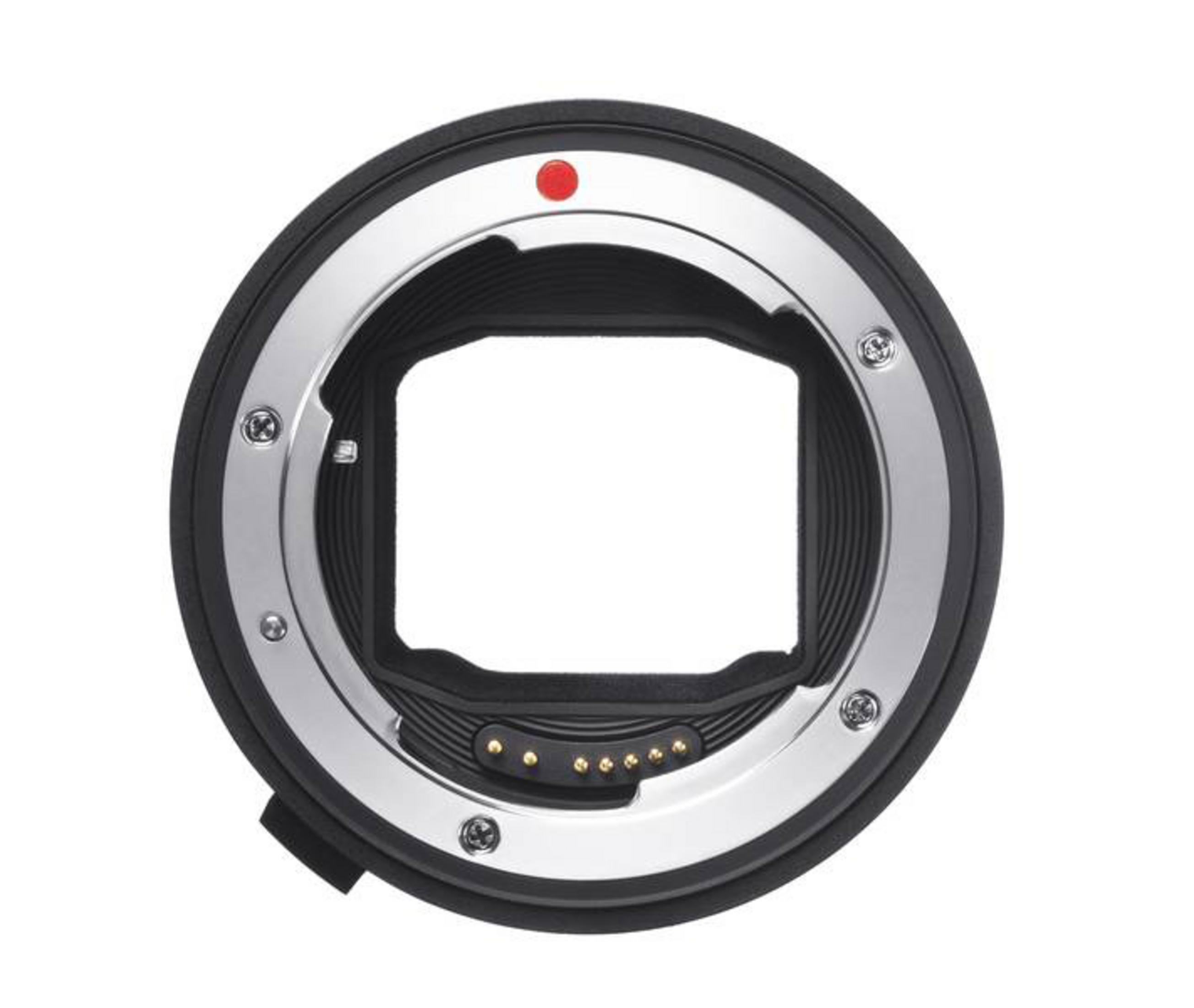 Un supporto per l'obiettivo della fotocamera, in metallo e nero, con un punto rosso.
