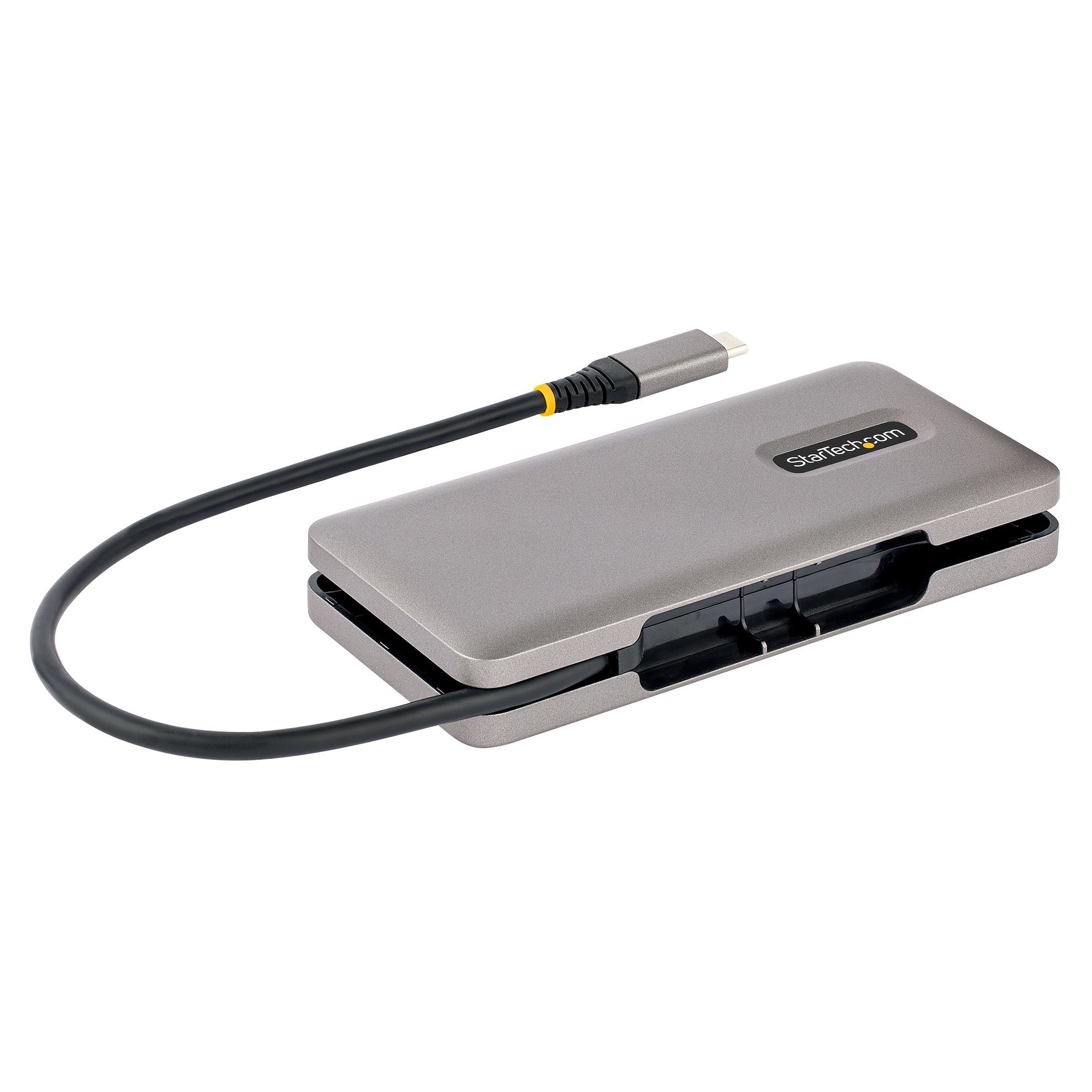Concentrador USB-C gris con cable conectado, vista en ángulo.
