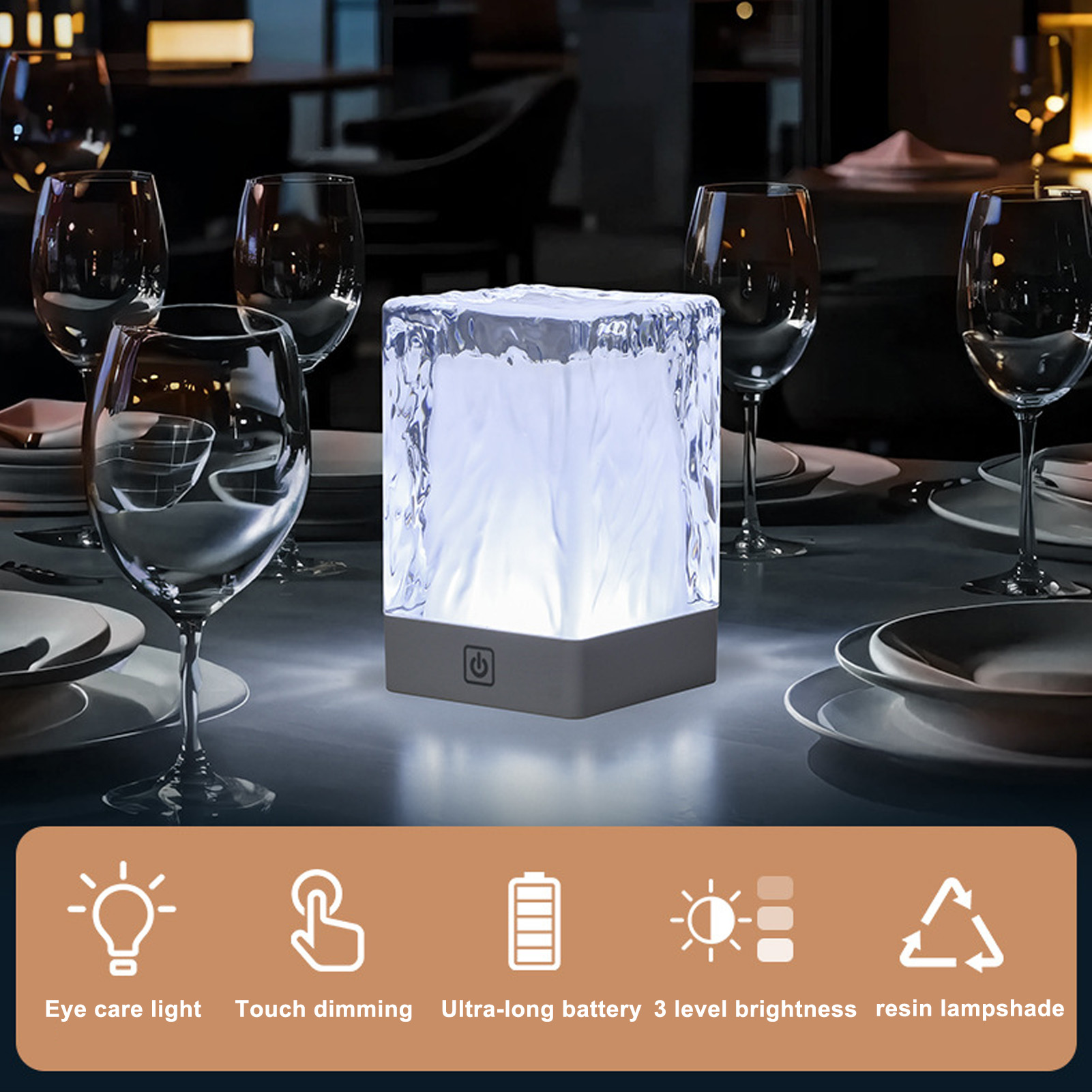 Eiswürfel-förmige Lampe auf einem Tisch mit Weingläsern, mit Funktionssymbolen.
