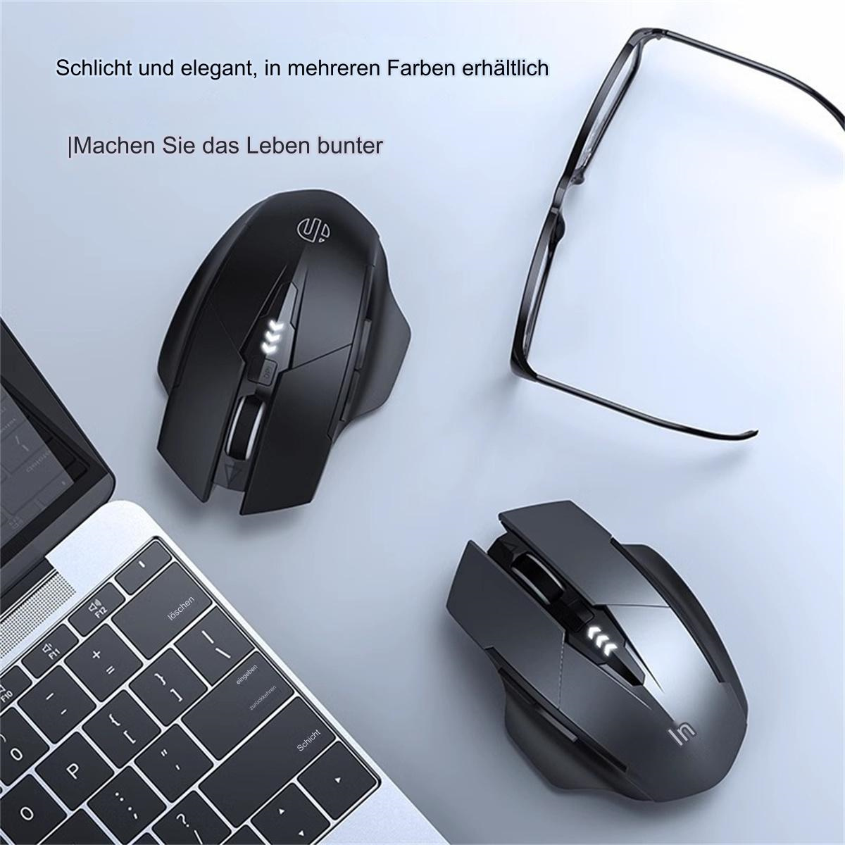 Zwei schwarze Computer-Mäuse. Eine liegt auf einem Schreibtisch und die andere darüber. Es gibt Brillen und einen Laptop.