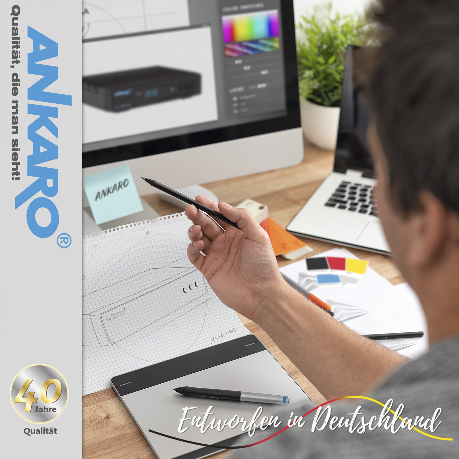 Eine Person, die auf einem Grafiktablett entwirft, mit einem Computerbildschirm und dem Text 'ANKARO'.