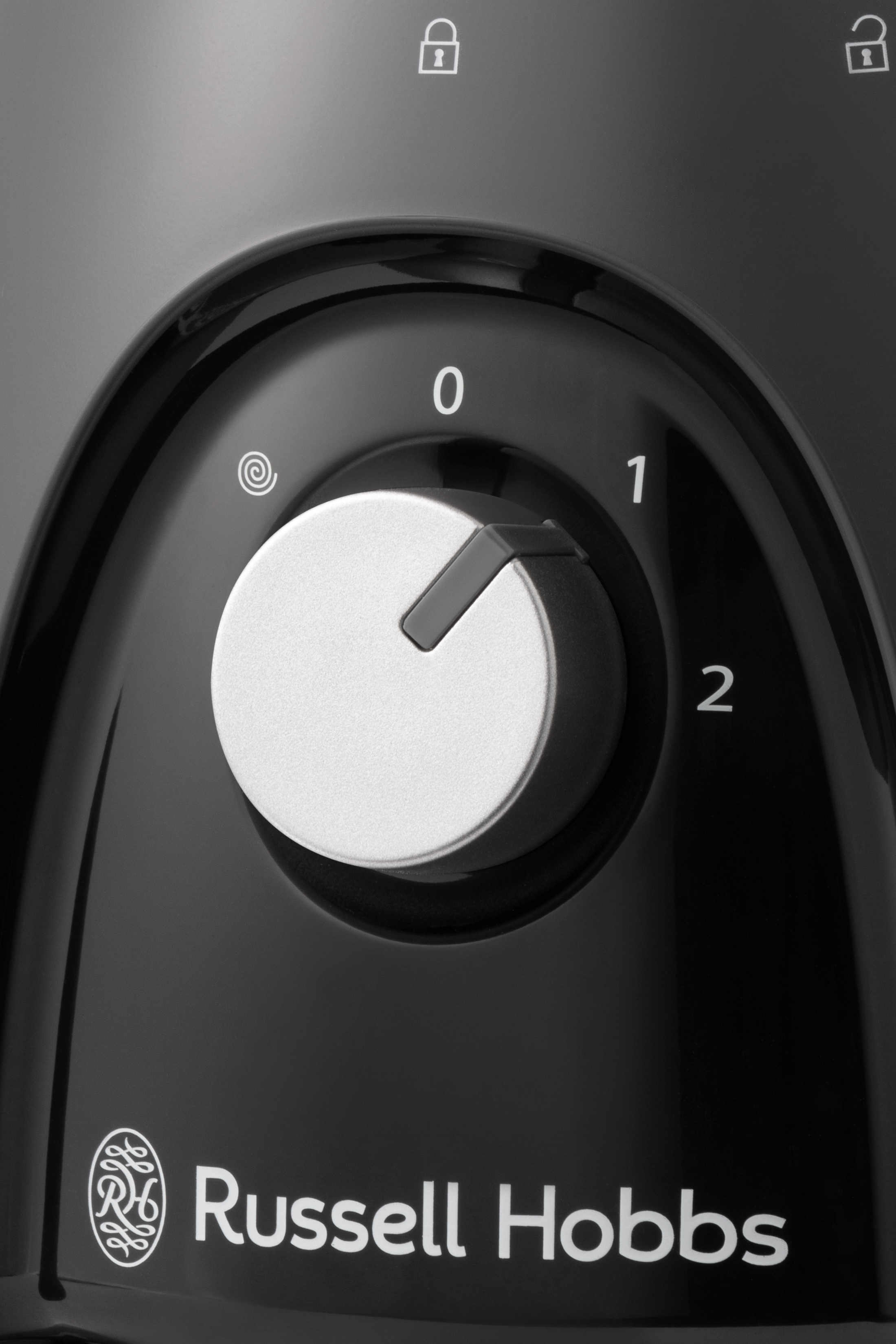 Schwarzer Mixer-Drehregler. Zahlen 0, 1, 2. Markenname Russell Hobbs. Schloss- und Entsperrsymbole.