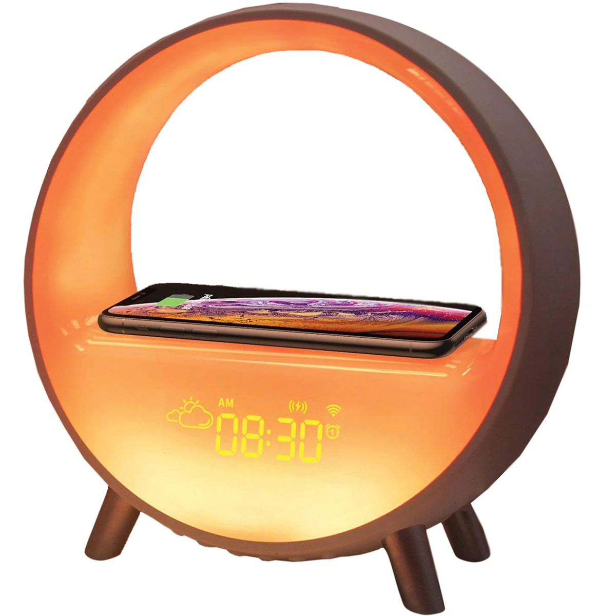 Eine orangefarbene ringförmige Lampe mit einem Telefon, das oben aufgeladen wird, und einer Digitaluhr.