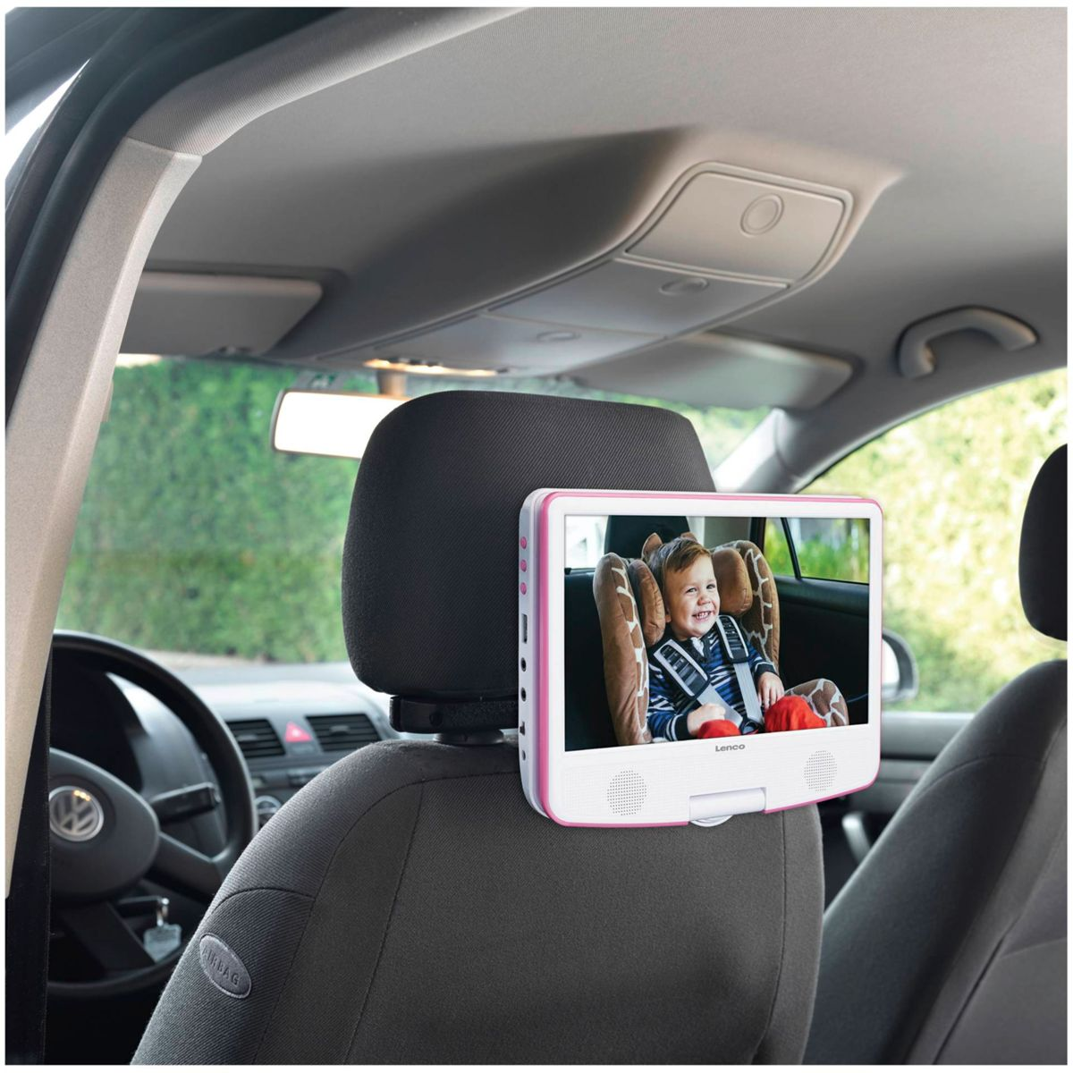 Zagłówek samochodowy z ekranem, pokazujący uśmiechnięte dziecko, z tłem wnętrza samochodu.