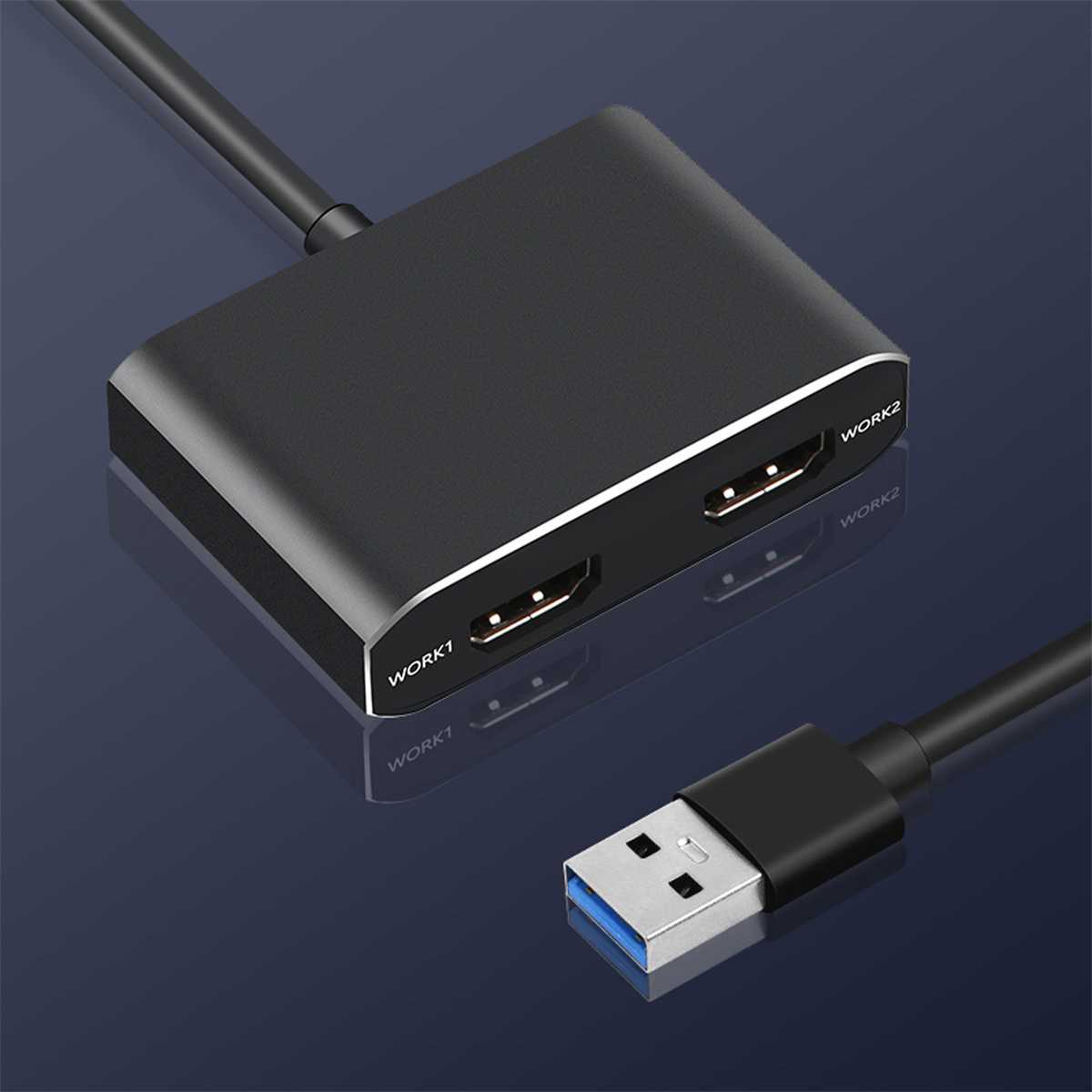Ein schwarzer USB-Hub mit HDMI-Anschlüssen und einem USB-Kabel. Es ist mit 'WORK1' und 'WORK2' beschriftet.
