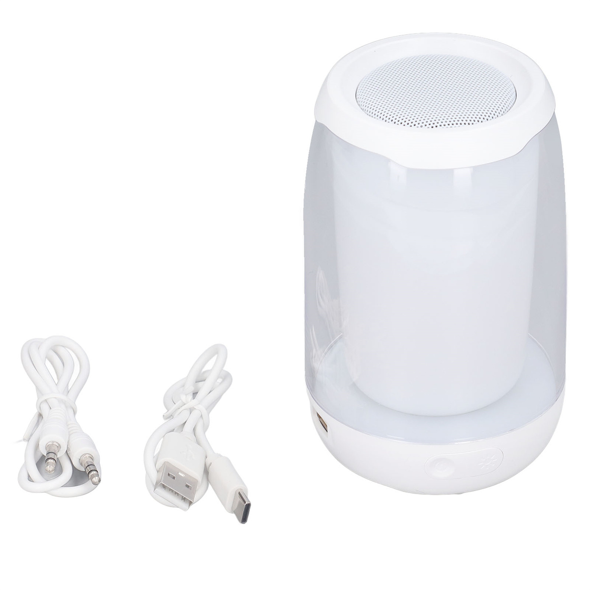 Weißer und klarer Kunststofflautsprecher mit weißem Kabel und USB-Kabel auf weißer Oberfläche.