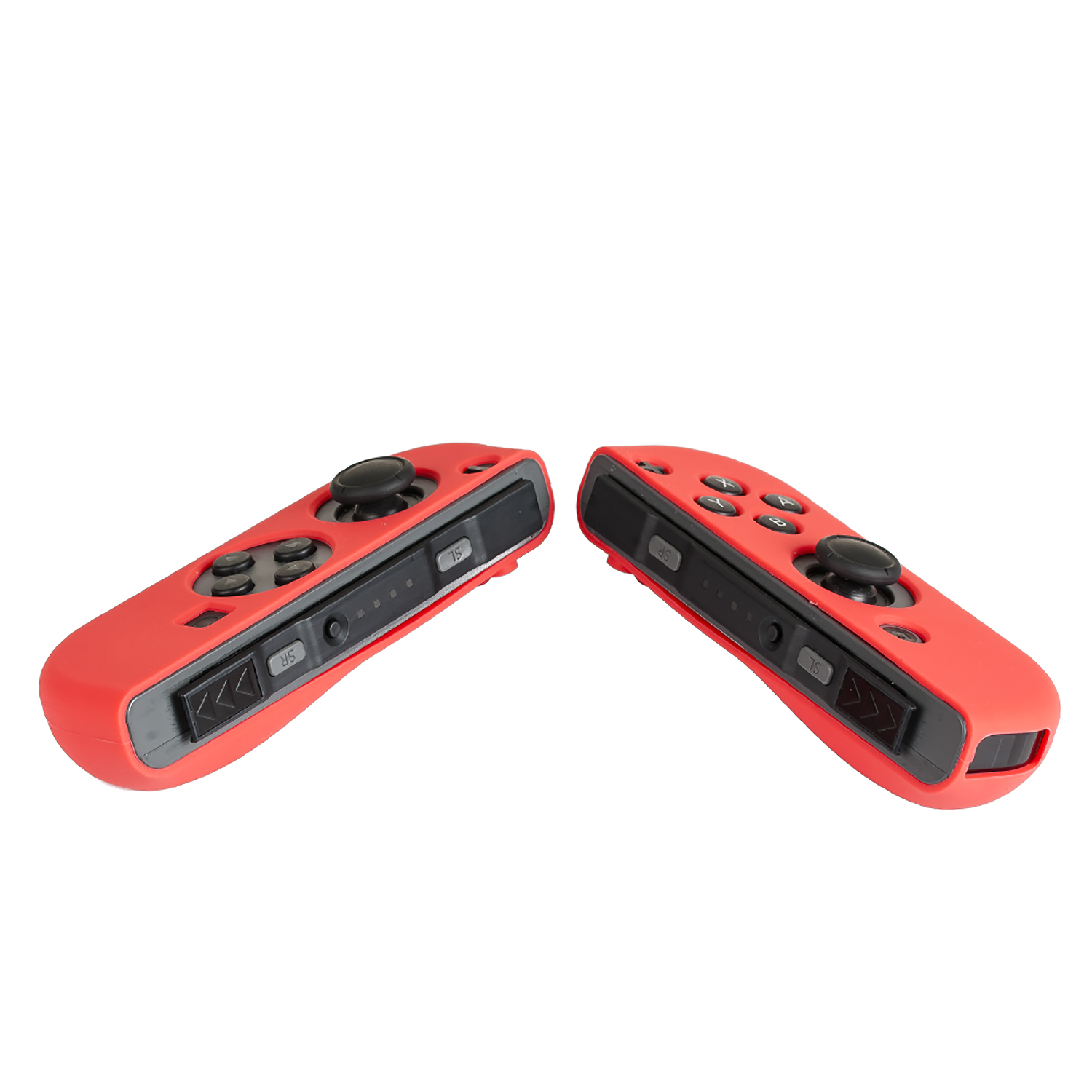 Dos mandos de juego rojos. Están orientados en direcciones opuestas y los botones son visibles en ambos mandos.