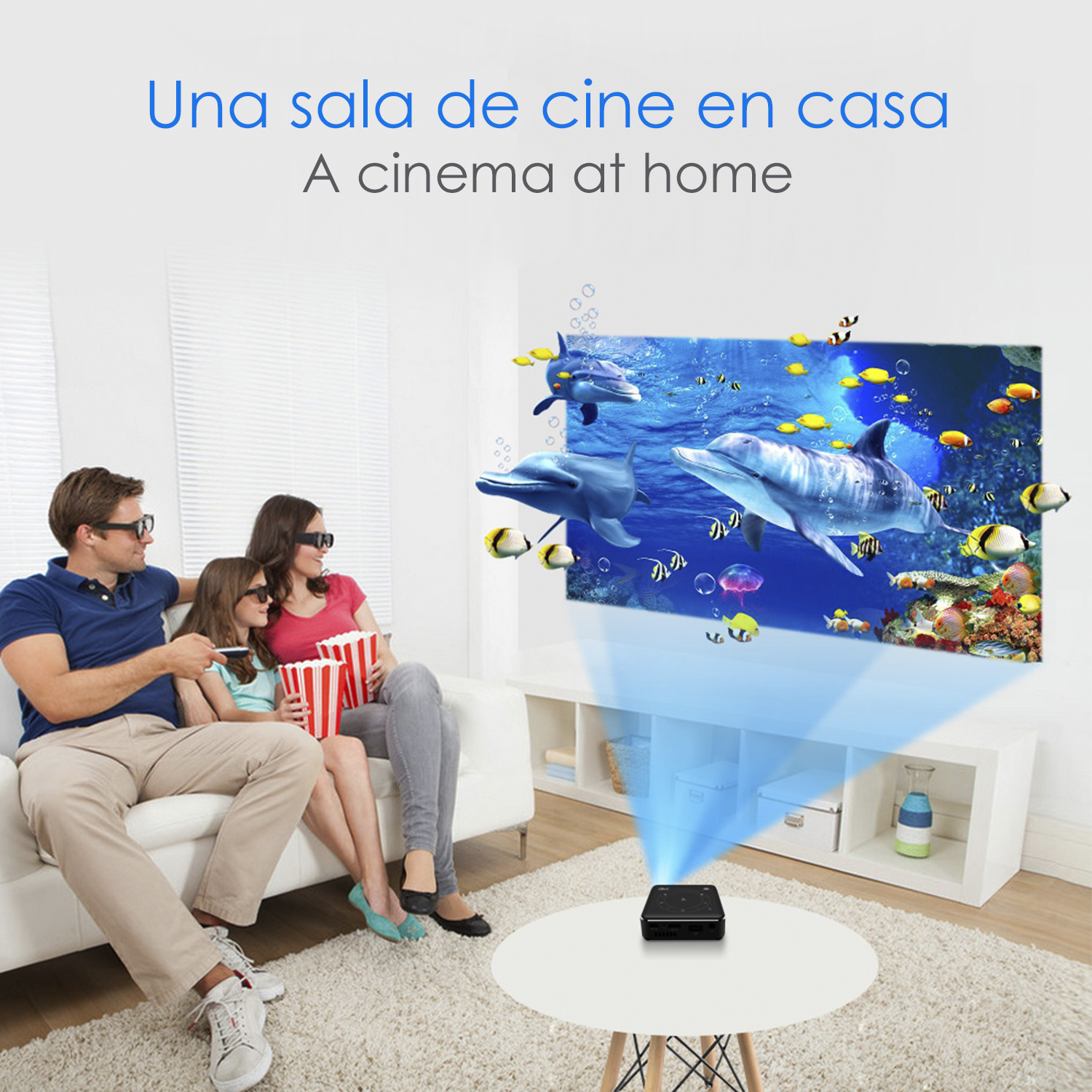 Una famiglia guarda una scena subacquea proiettata su un muro bianco. Indossano occhiali 3D.