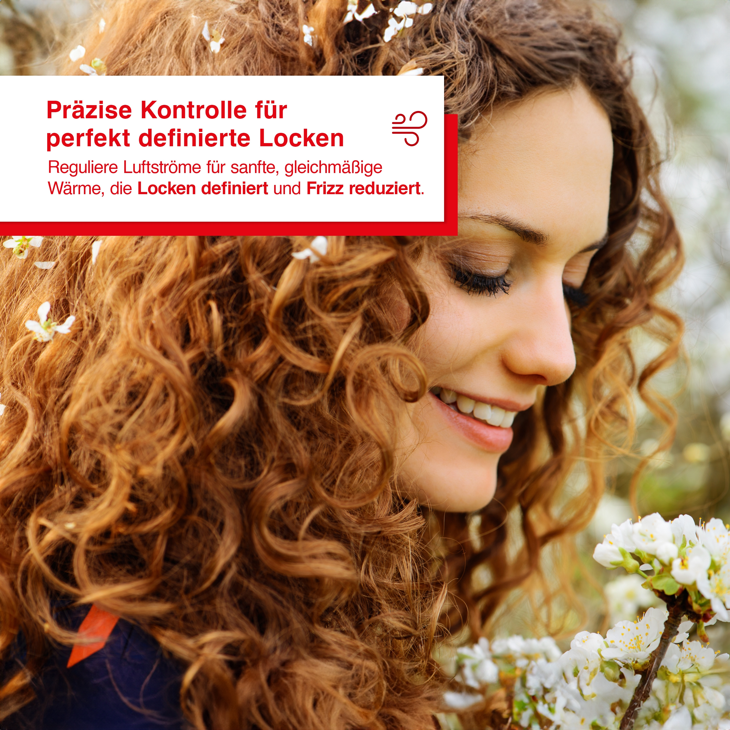 Frau mit lockigem, rotem Haar und weißen Blumen. Text: Präzise Kontrolle für perfekte Locken.