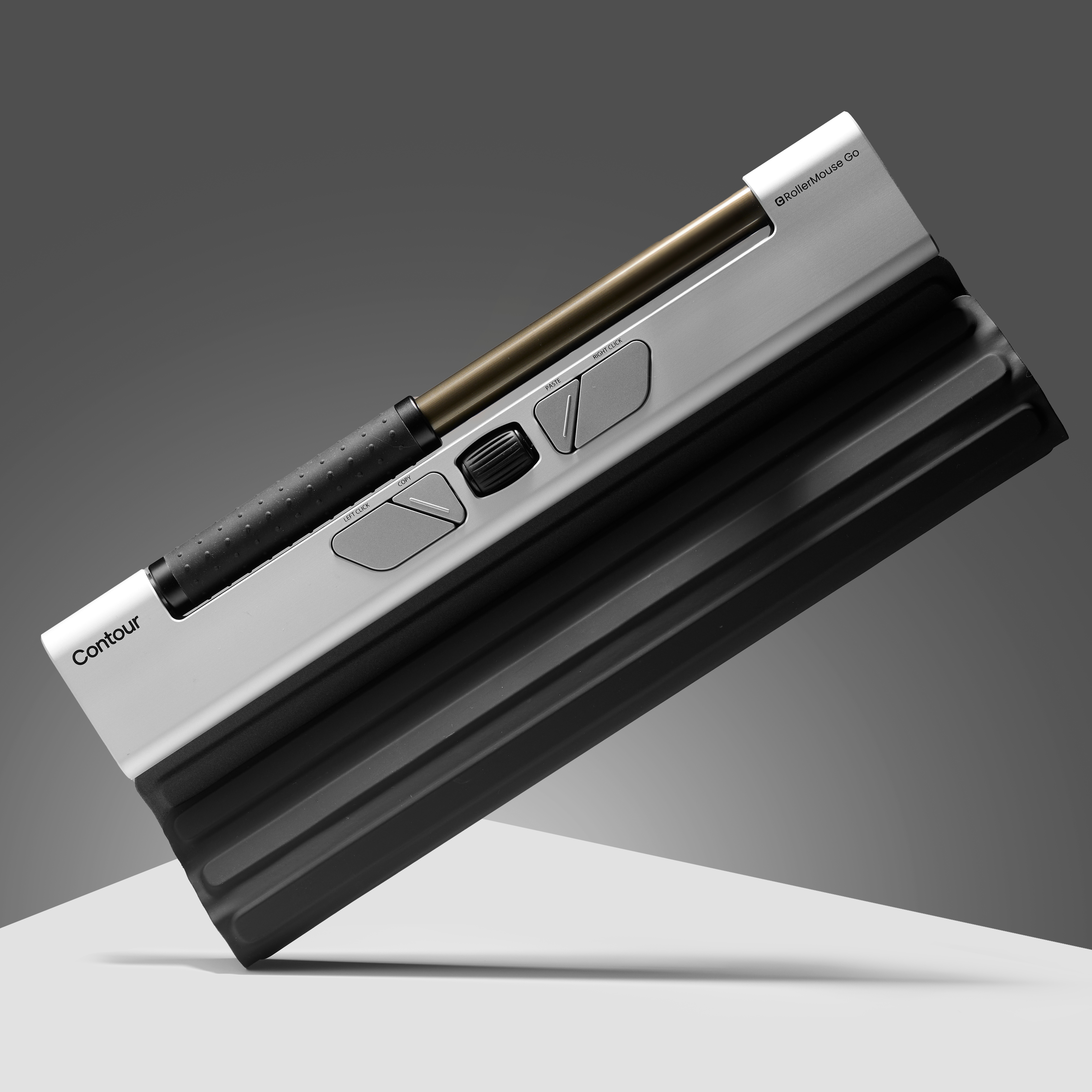 Contour RollerMouse Pro on a white surface and gray background.  Black and silver colors.