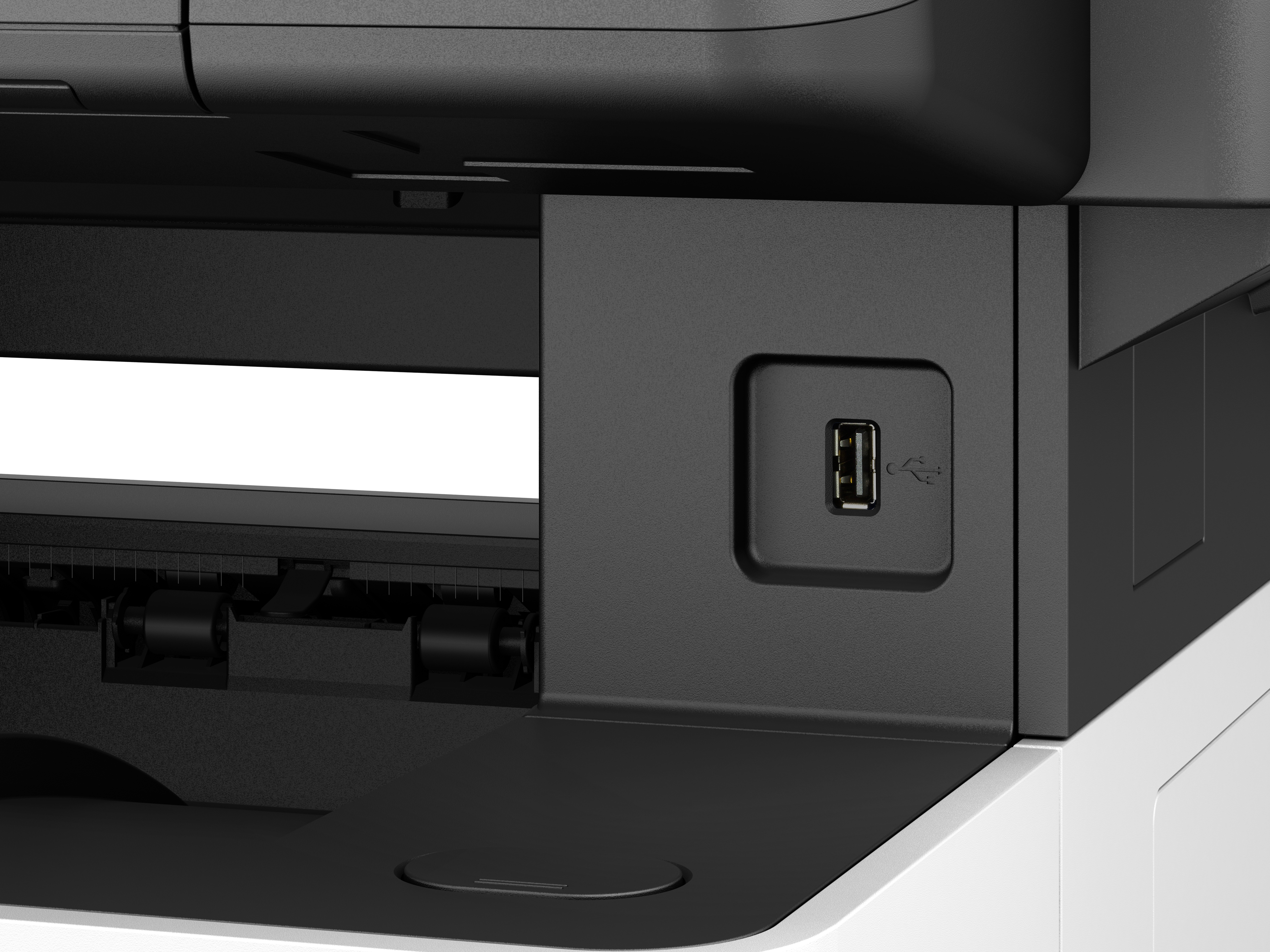 Zbliżenie czarno-białej drukarki z portem USB. Drukarka jest częściowo widoczna.