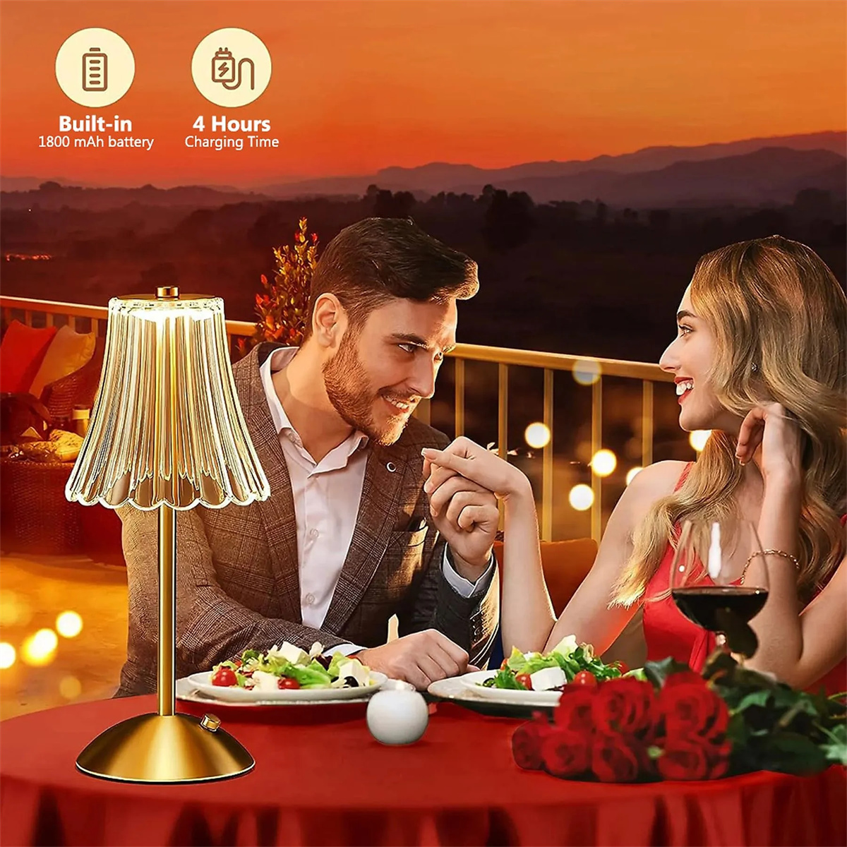 Ein Paar bei einem romantischen Abendessen, beleuchtet von einer Tischlampe. Roter Tisch, Sonnenuntergang.