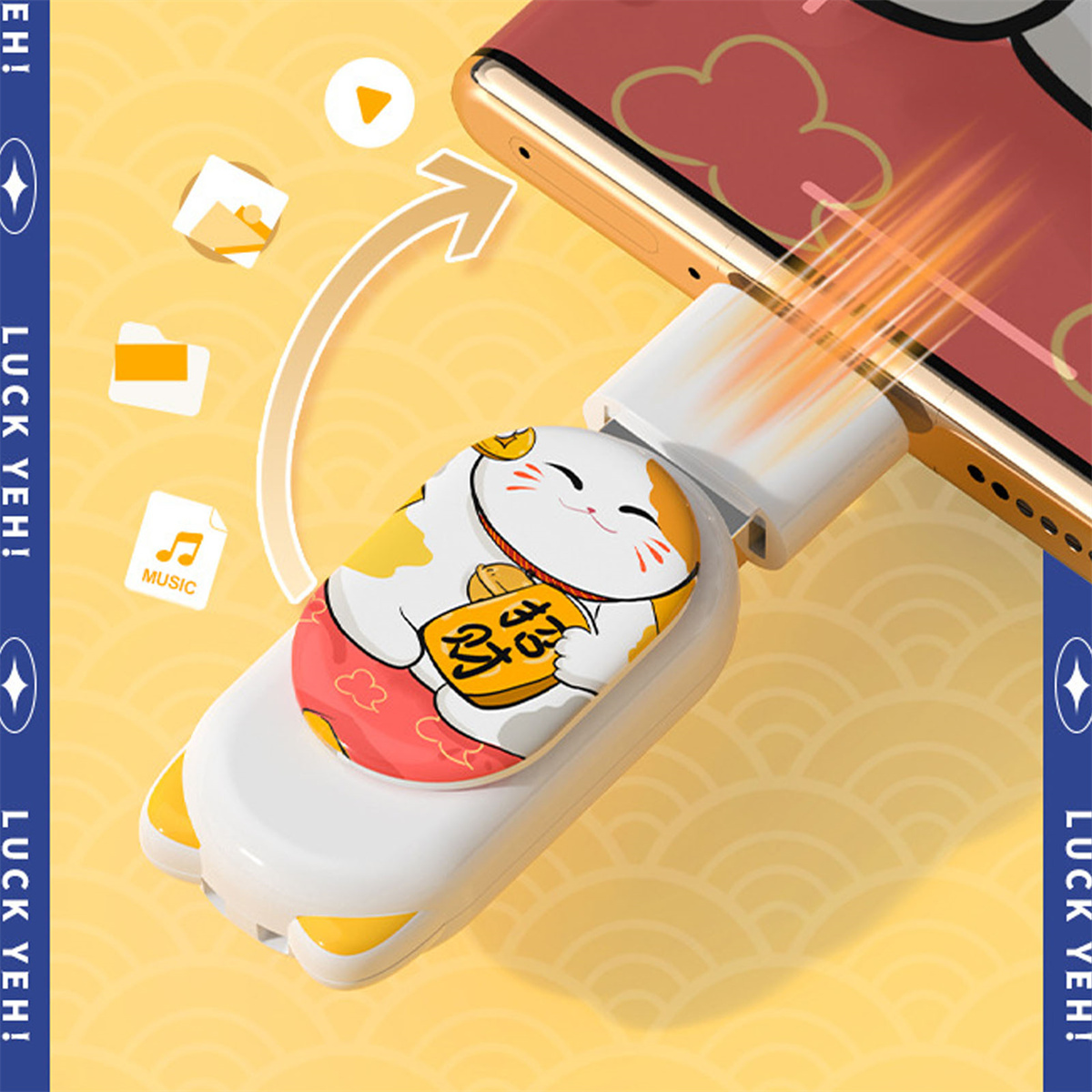 Ein Mobiltelefon mit einem katzenförmigen USB-Ladegerät. Das Telefon ist rot, das Ladegerät hat ein Katzendesign.