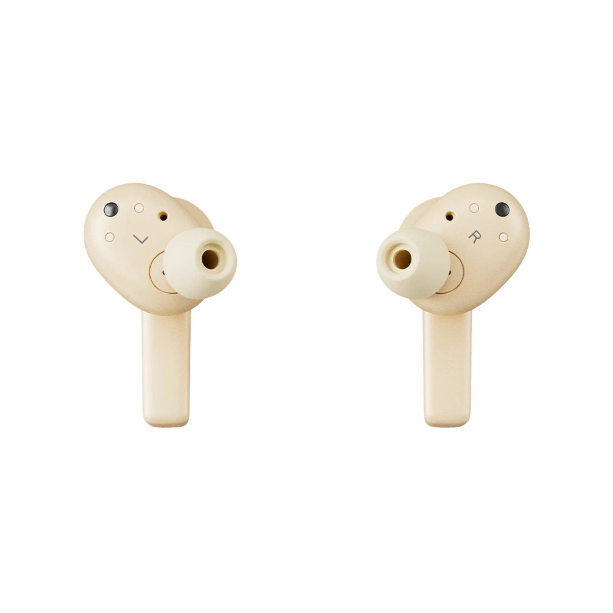 Two beige earbuds, white background. Each has a small opening.