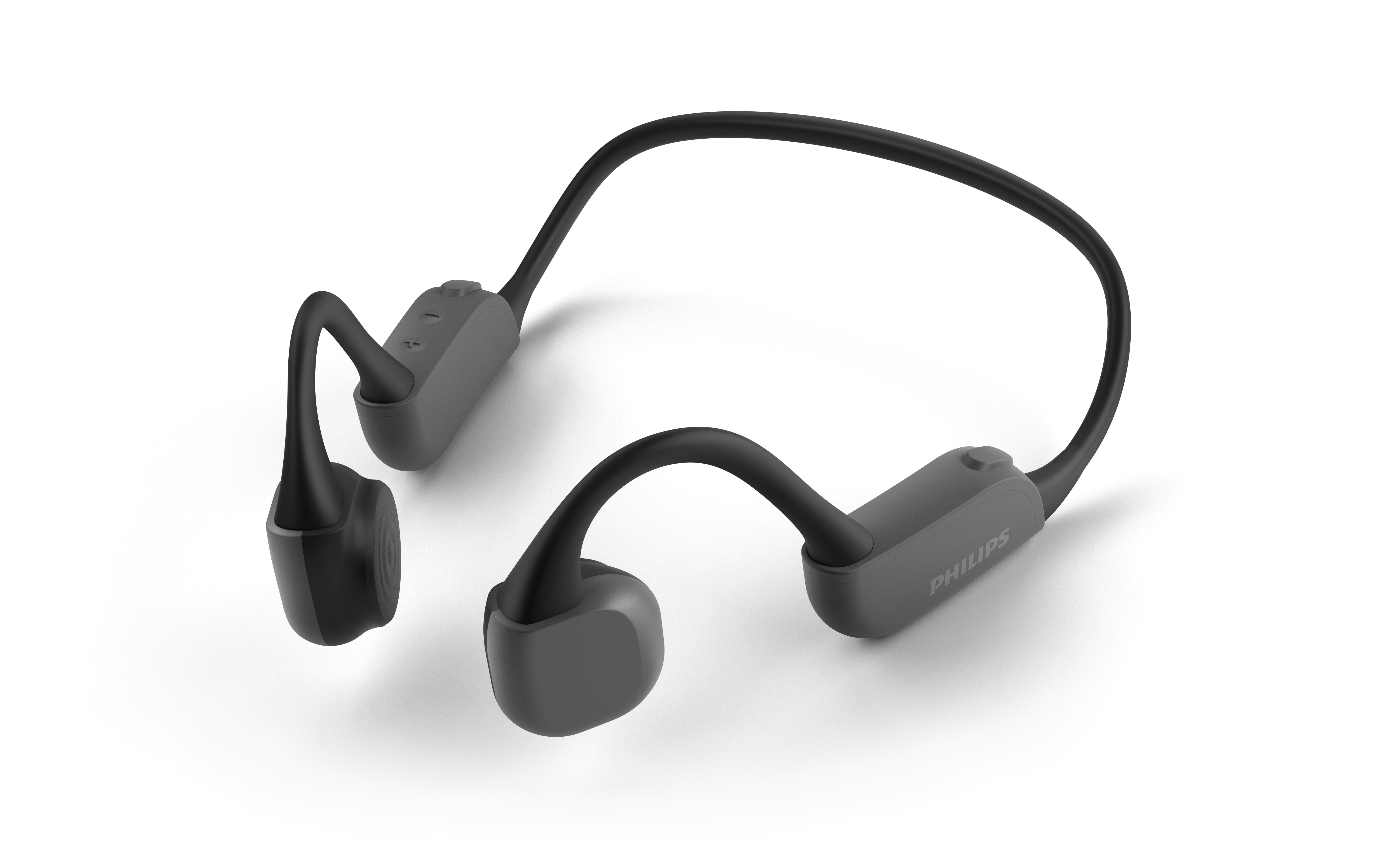 Auriculares de conducción ósea Philips grises. Se colocan alrededor de las orejas.