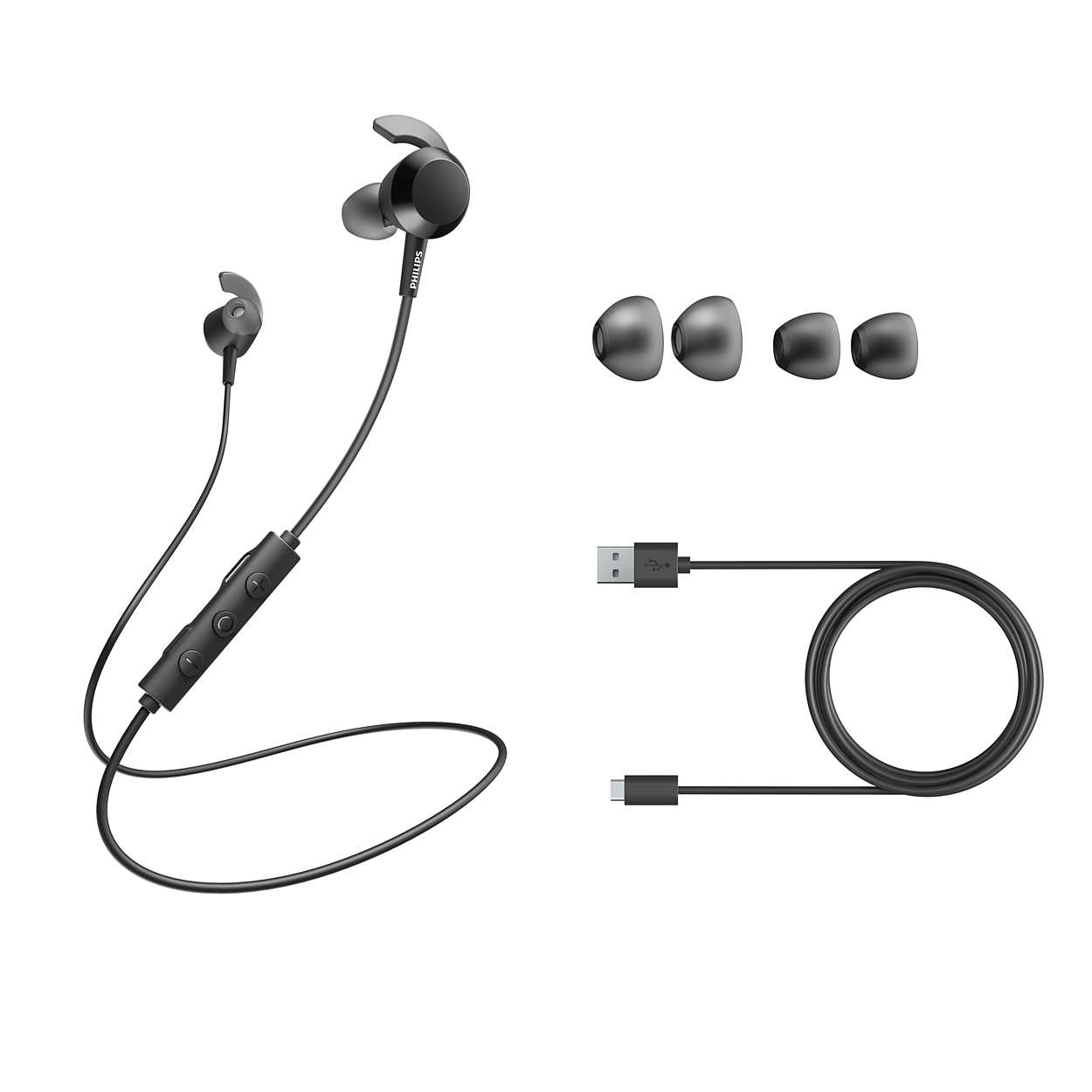 Schwarze und silberne Ohrhörer mit Ladekabel und zusätzlichen Ohrstöpseln. Weißer Hintergrund.