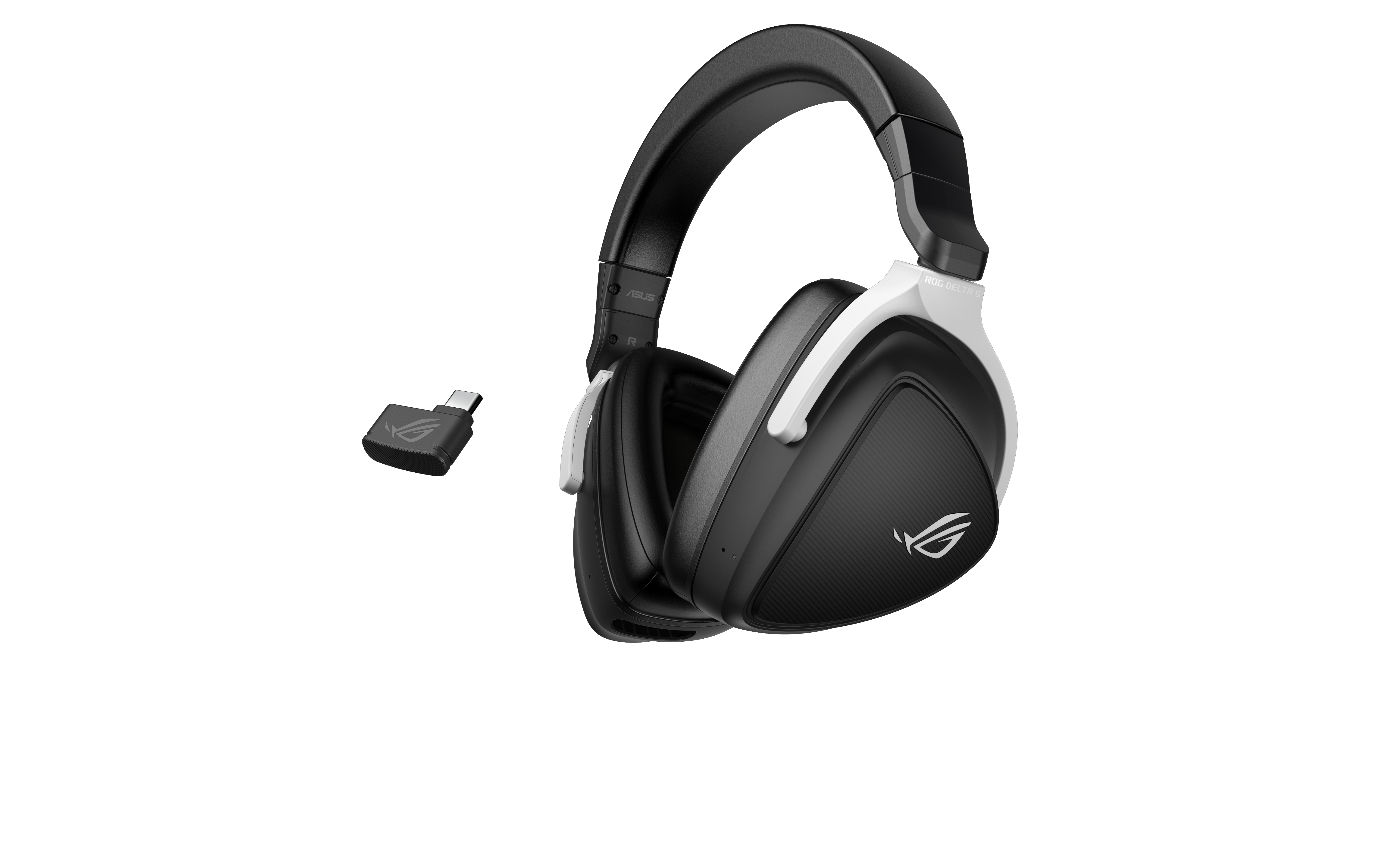 Cuffie da gioco in bianco e nero con un piccolo dongle USB. Le cuffie hanno il logo ROG.