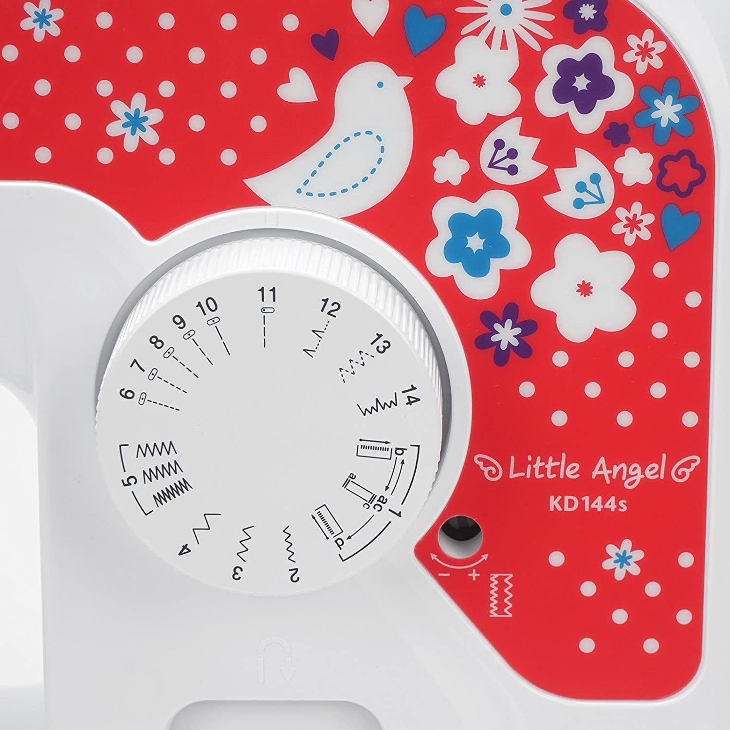 Close-up of a sewing machine dial. The dial is white with red background and floral design.