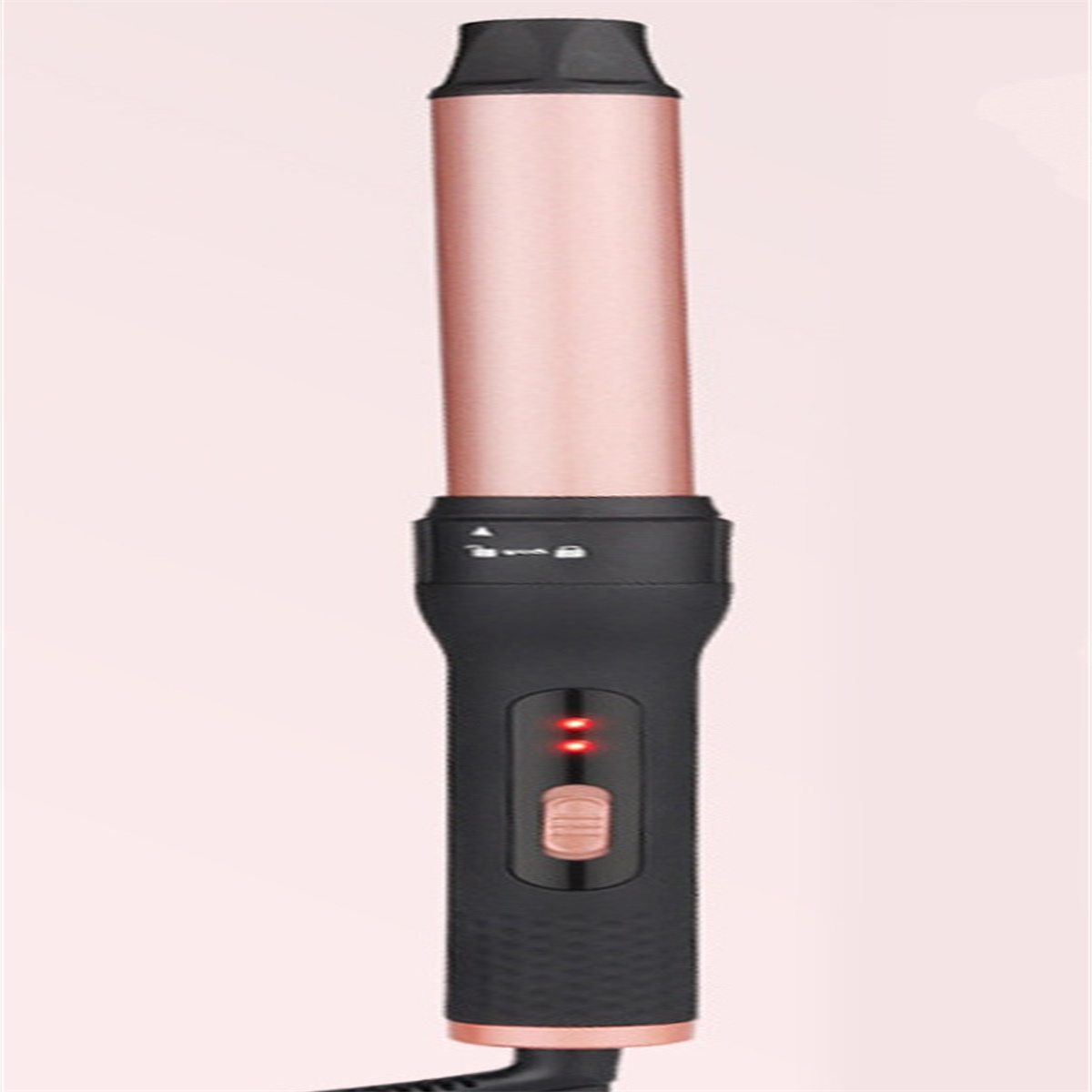 Roségoldener und schwarzer Lockenstab mit schwarzem Griff und rotem Licht.
